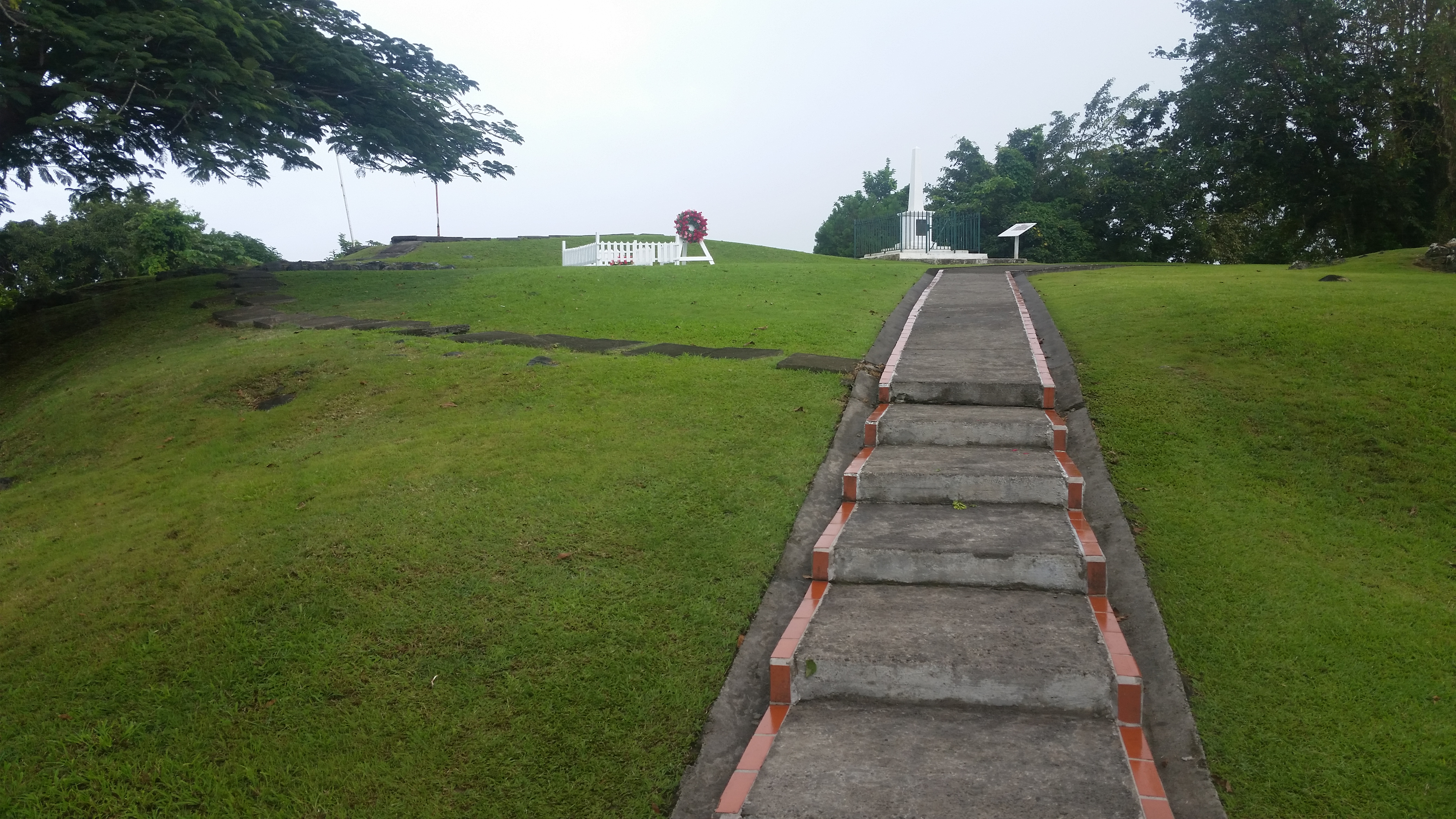 Morne Fortune's Shipley Battery on Fort Charlotte, with the grave of Derek Walcott, and the Inniskilling Monument