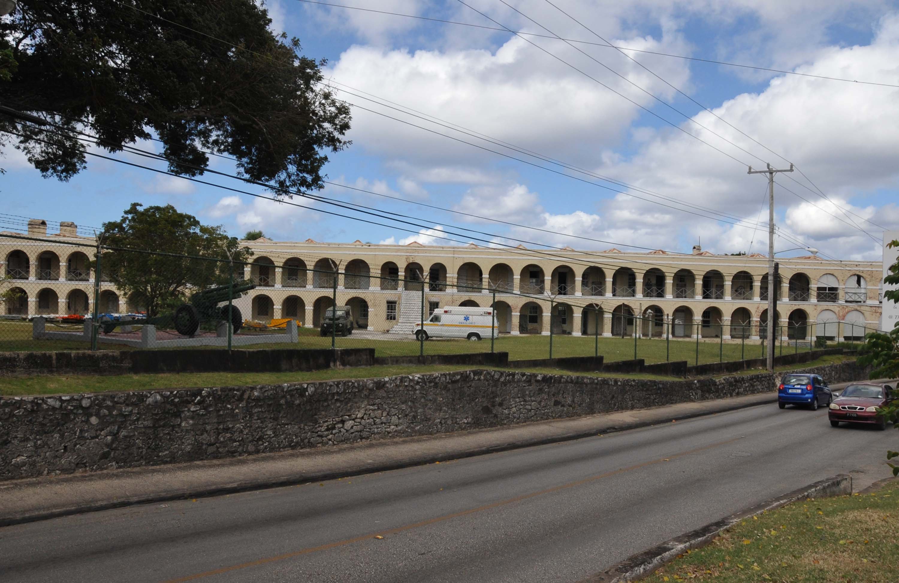 STONE BARRACKS - THE STONE ARCHES WERE ADDED AFTER A 1831 HURRICANE REPLACING WOODEN BALUSTRADES