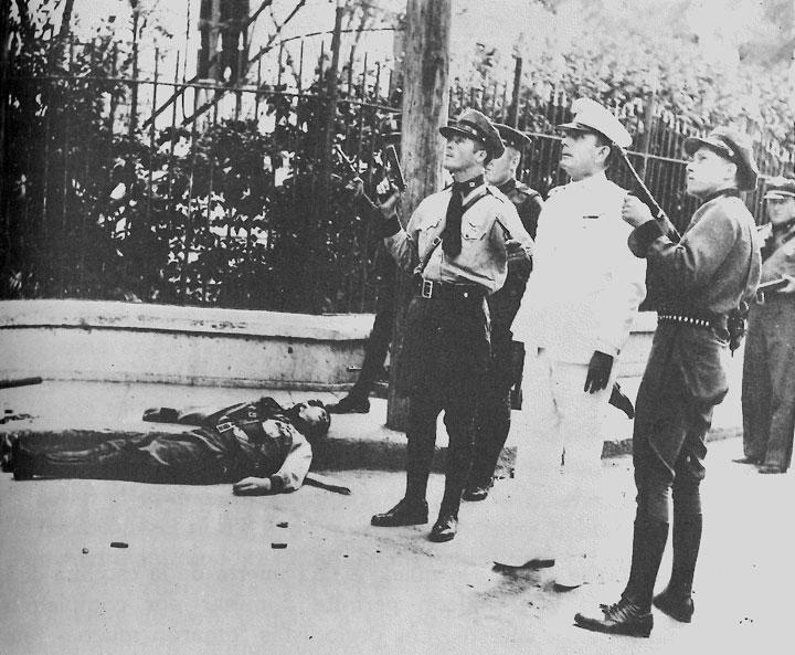 This is a famous historical photo taken of the Ponce Massacre in Ponce, Puerto Rico. The photo was taken by Angelo Lebron, a photo journalist for the newspaper El Mundo.
In accordance with the "Copyright Term and the Public Domain in the United States (January 1, 2009),[1] images published with notice but with no subsequent copyright renewal from 1923 through 1963, are public domain due to copyright expiration."

El Mundo, which went out of service in 1986, could not have renewed its copyright which expired. Therefore, since Puerto Rico fell under US copyright in 1937 as well as today, this would make the Ponce Massacre image public domain. (UTC)