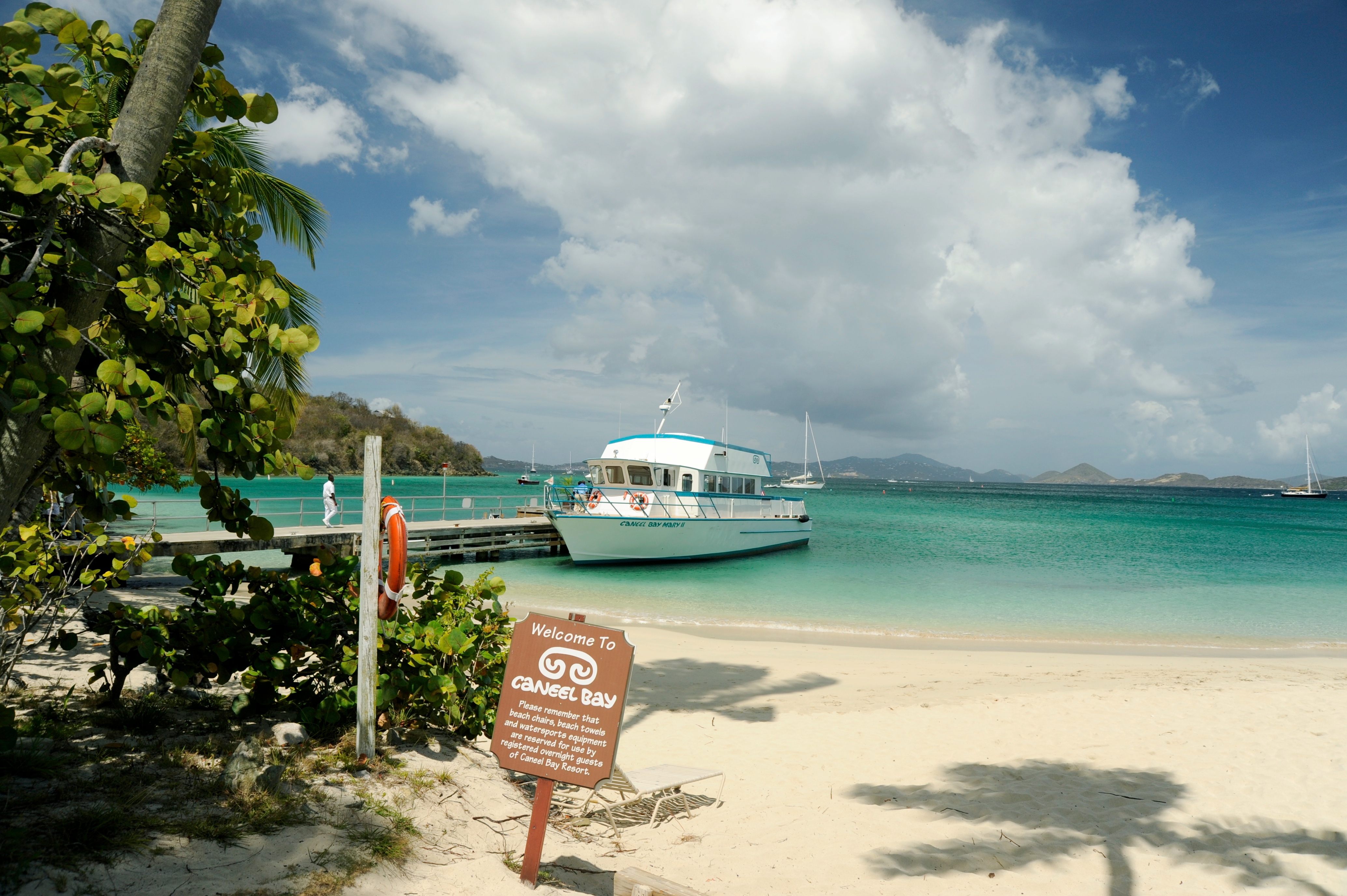 Guests of the Caneel Bay resort disembark at the Caneel Beach from the resort's own boat, Mary II.