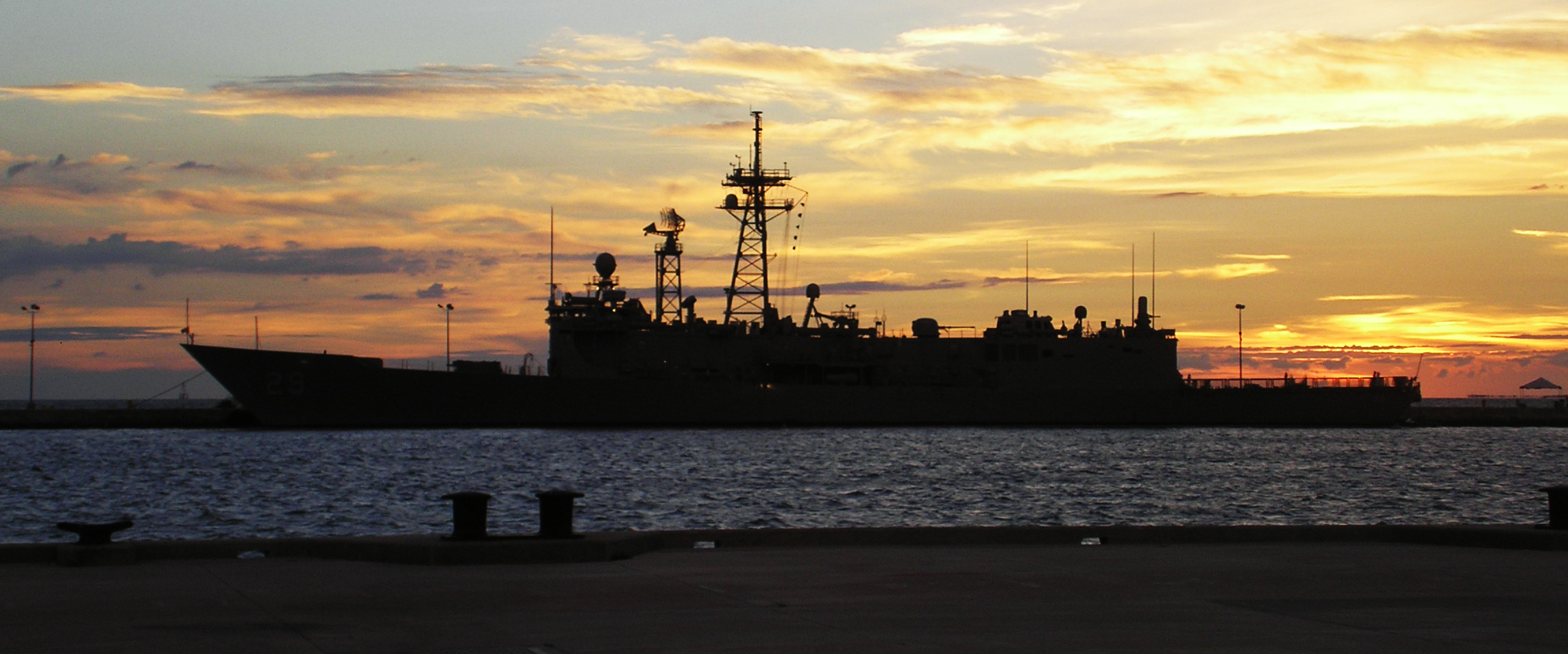 The Perry-class frigate USS Steven W. Groves (FFG-29) during a port visit in Key West, Florida on July 22, 2007. The ship is moored at the Outer Mole Pier in Key West, with the sunset behind it. [[:en:User:JKBrooks85|JKBrooks85]] 23:28, 23 July 2007 (UTC)