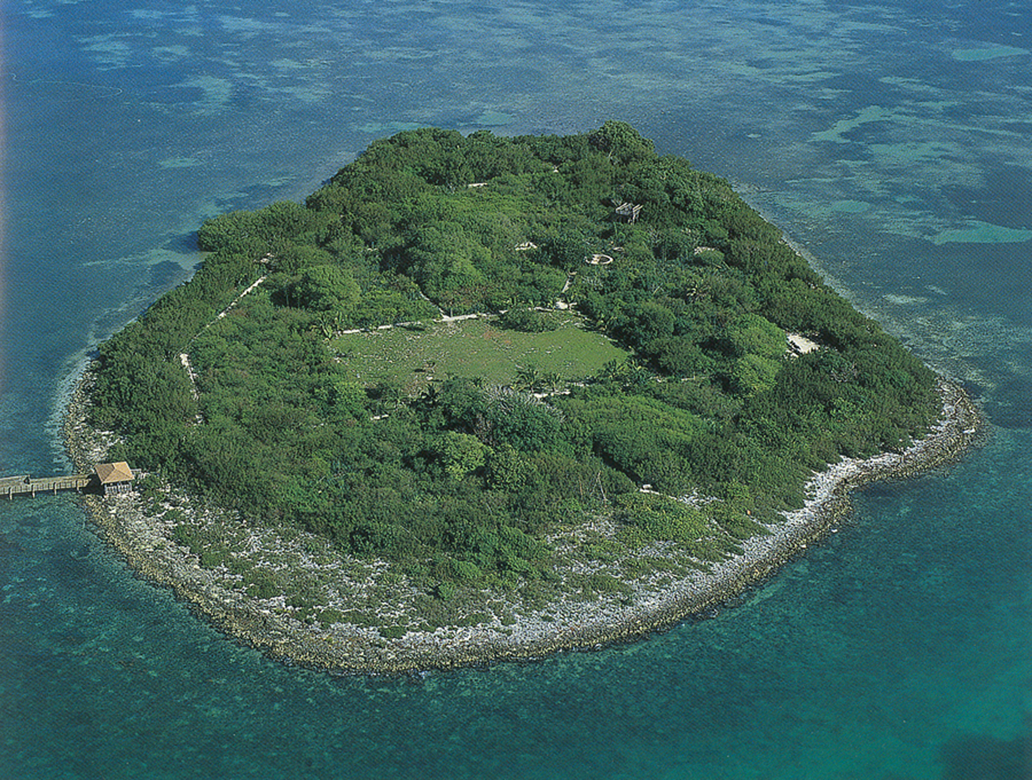 Scope and content:  The original finding aid described this photograph as:
Original Caption: The aerial view of 10-acre Indian Key in Florida Bay adjacent to the Florida Keys Scenic Highway reveals the foundations of buildings and cisterns dating back to the 1830s alongside a modern-day dock.
Location: Indian Key, Florida (24.889° N 80.677° W)

Status: Public domain.
