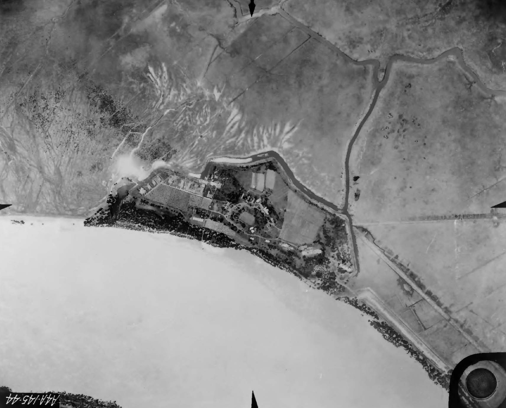 Fort St. Philip, Plaquemines Parish, Louisiana. Air view, 1935, showing condition of the Fort at the time, and the surrounding area, with farmland, bend in the Mississippi River.