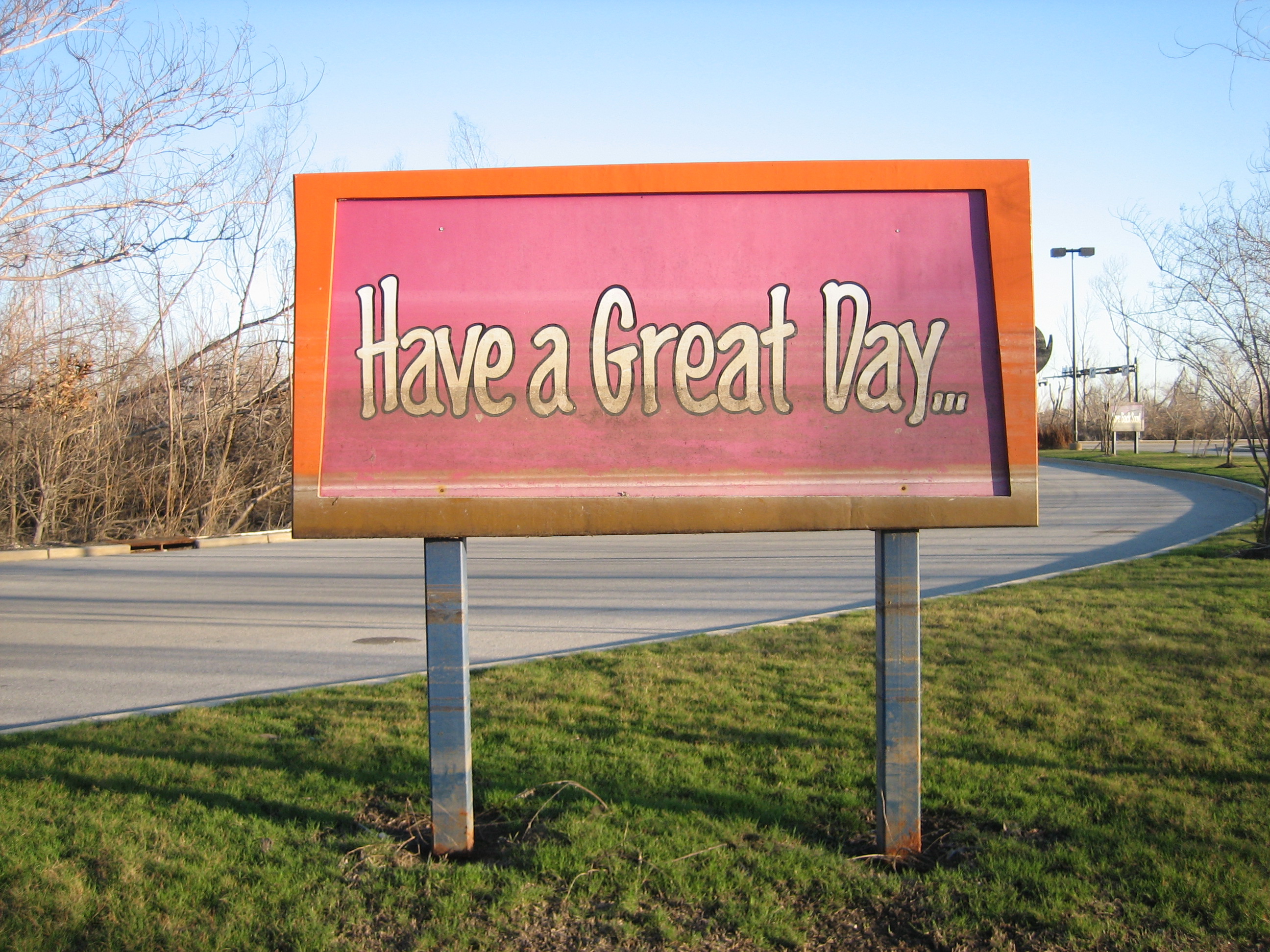 New Orleans after Hurricane Katrina:
Six Flags New Orleans amusement park was flooded badly after the storm. 

"Have A Great Day" sign with lines of long standing floodwater visible.