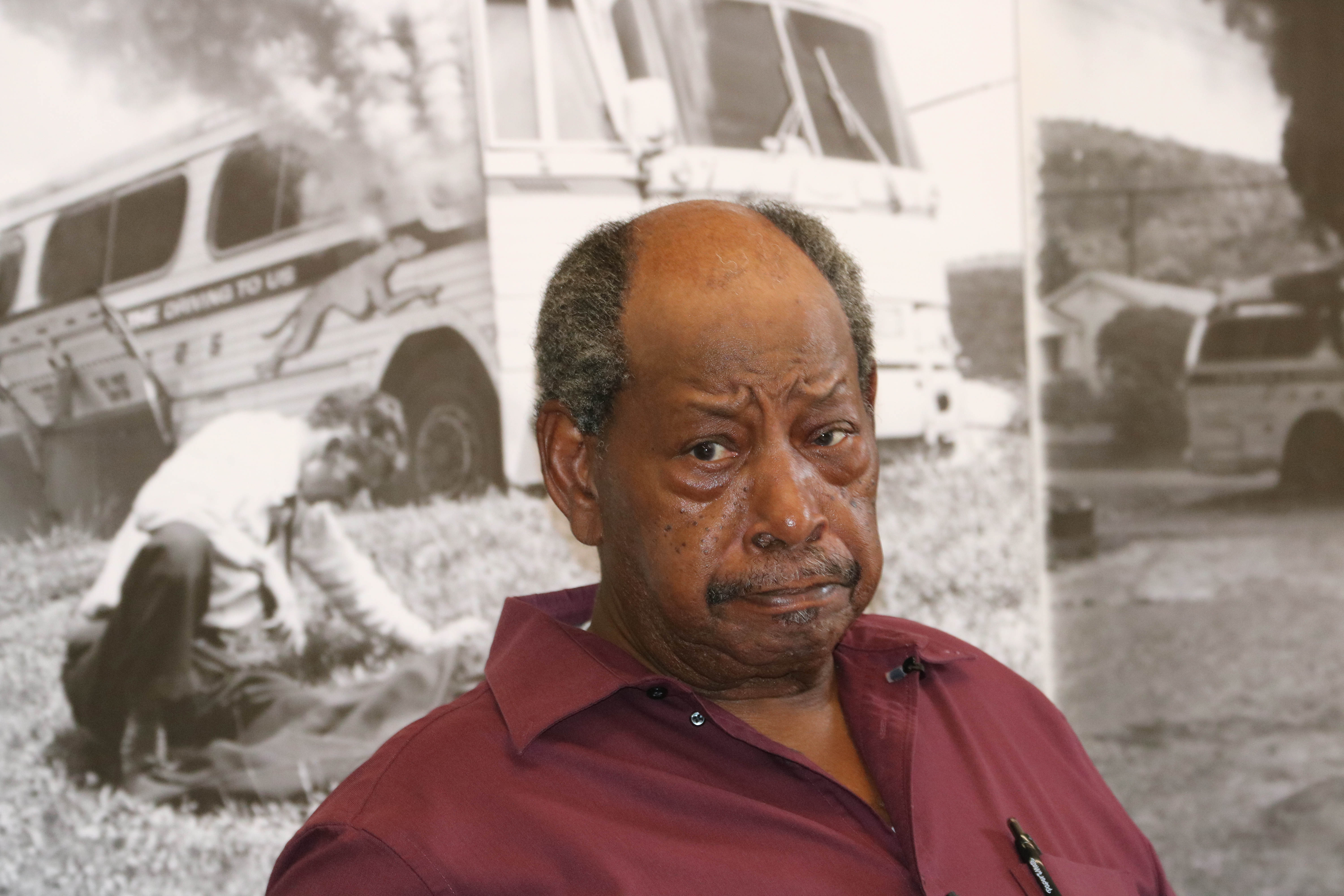 man seen from chest up wearing maroon shirt; black and white photos in background
William "Bill" Harbour was 19 and a student at Tennessee State University when he joined the Freedom Rider Movement. He is also the co-chair of the Freedom Riders Park Board.
Keywords: civil rights; black history; alabama; civil rights movement