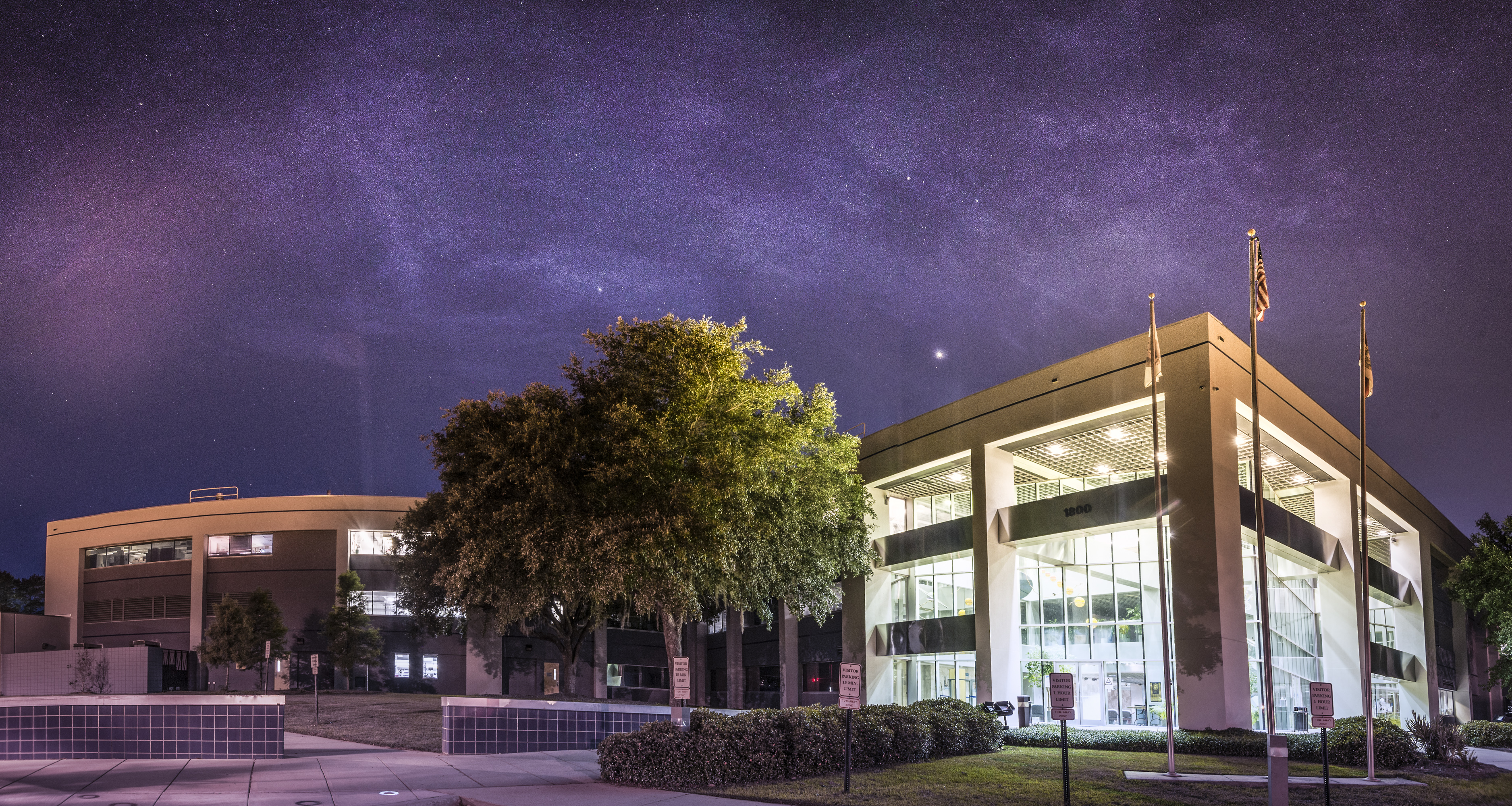 The MagLab's headquarters building is majestic under a beautiful Tallahassee night sky.