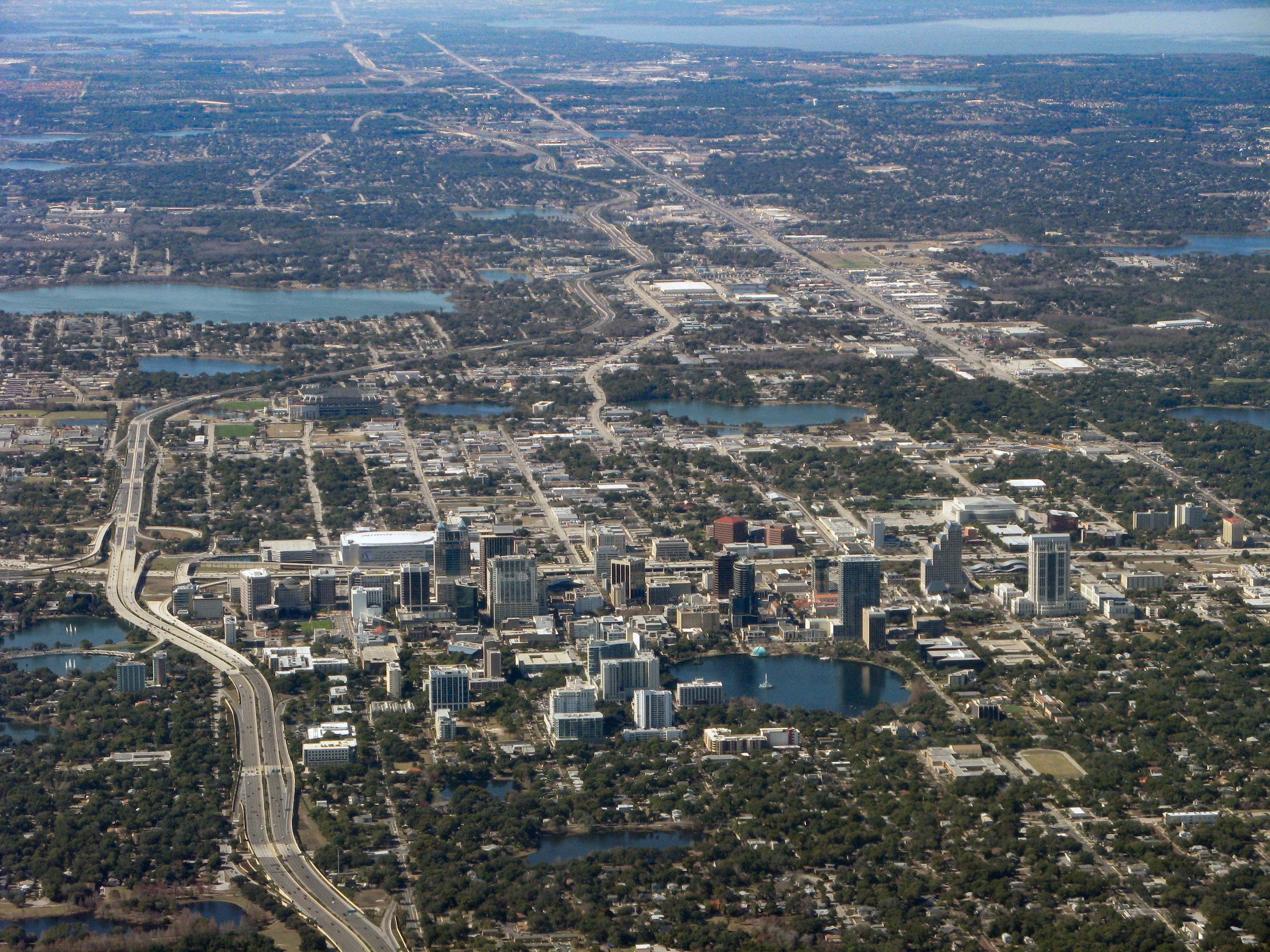 Aerial view of w:Orlando, Florida from a commercial aircraft. w:Lake Apopka is in the upper-right corner; w:Florida State Road 50 connects the city to past the lake; w:Florida State Road 408 is on the left-hand side.