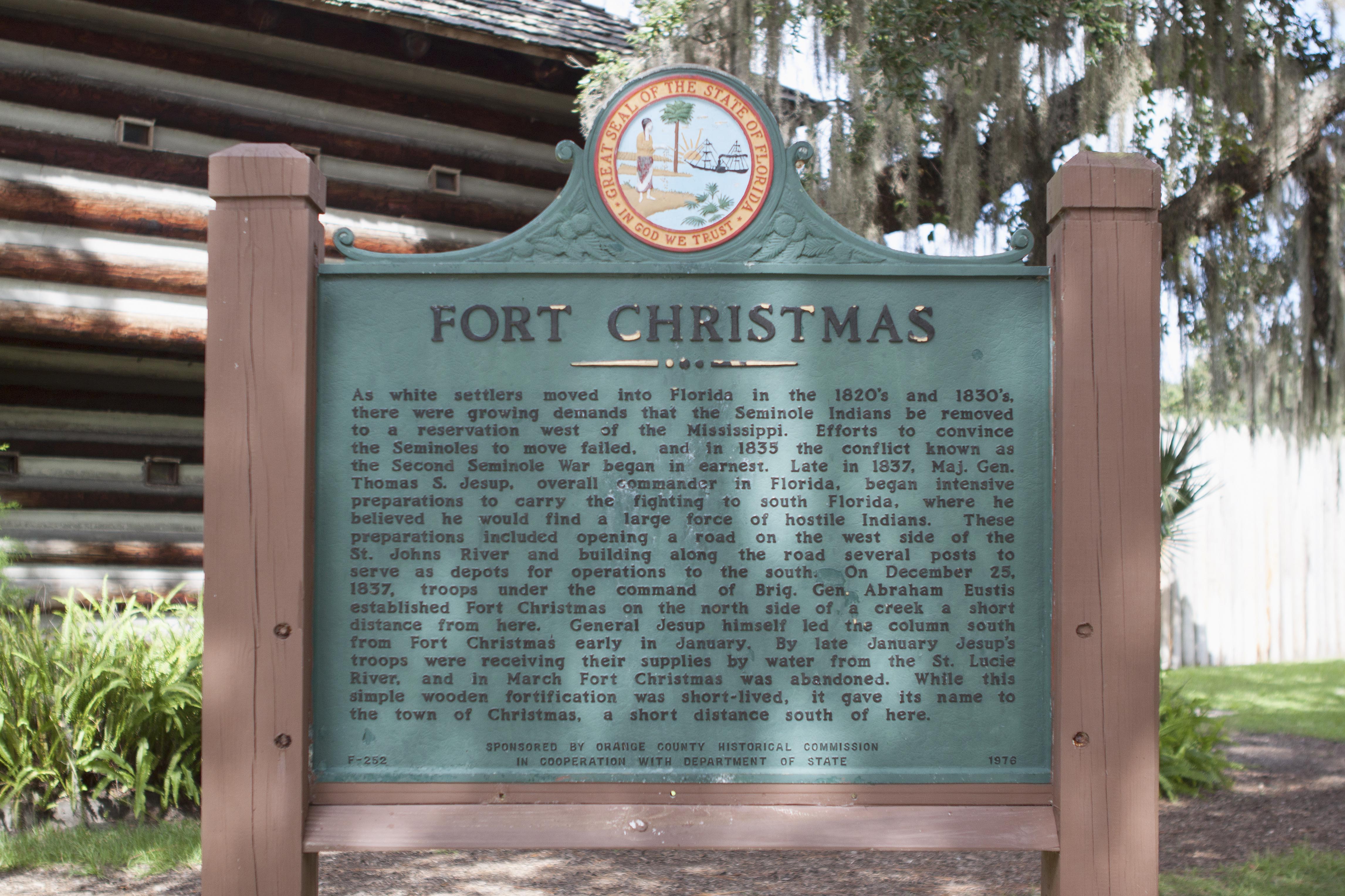 The historical marker located at the Fort Christmas Historical Park describing the history of Fort Christmas. The marker was set in place by the Orange County Historical Society and the Florida Department of State.