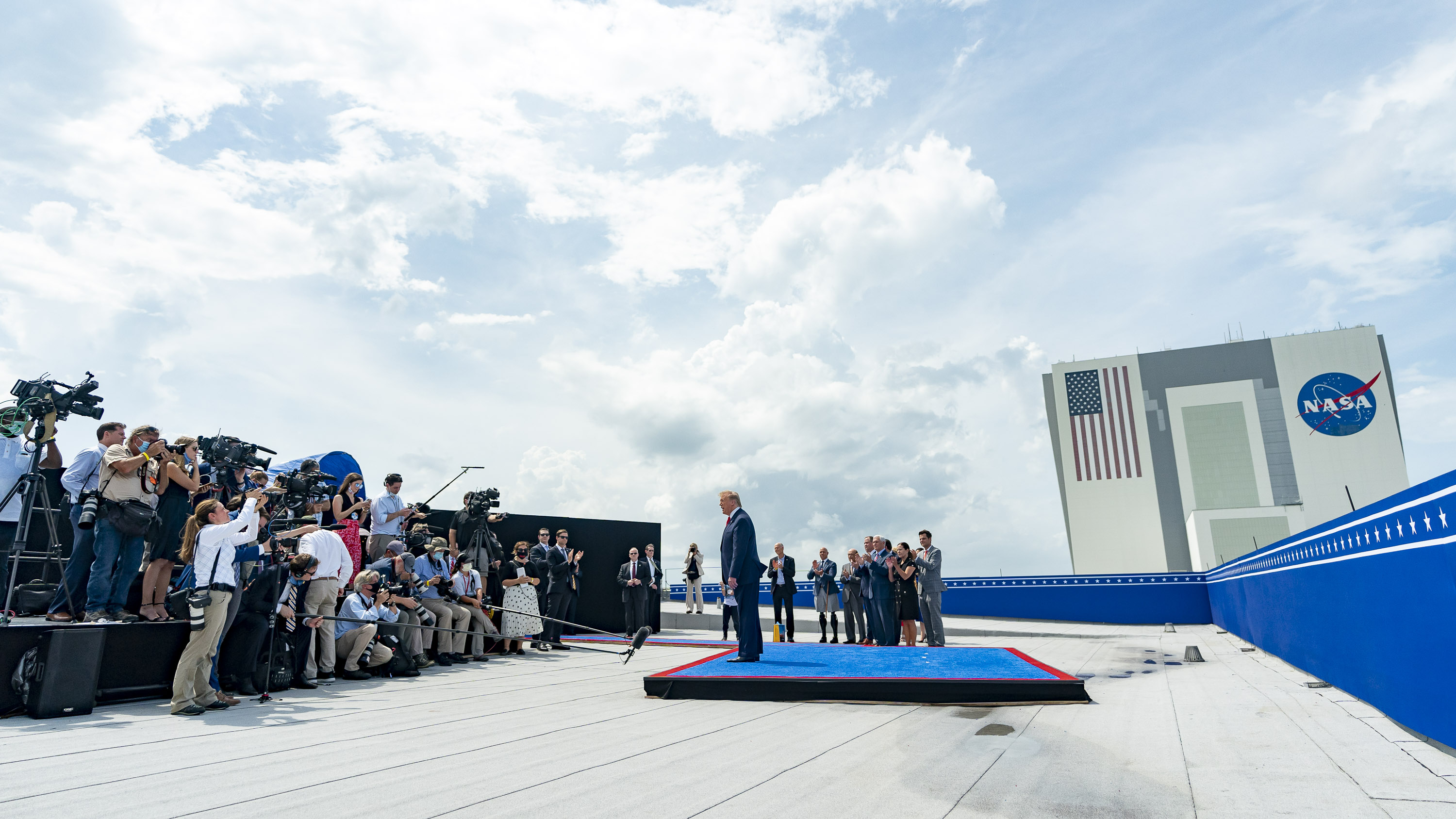 President Donald J. takes questions from the press at the Operational Support Building Saturday, May 30, 2020, following the successful SpaceX Demonstration Mission 2 launch at the Kennedy Space Center Cape Canaveral, Fla. (Official White House Photo by Amy Rossetti)