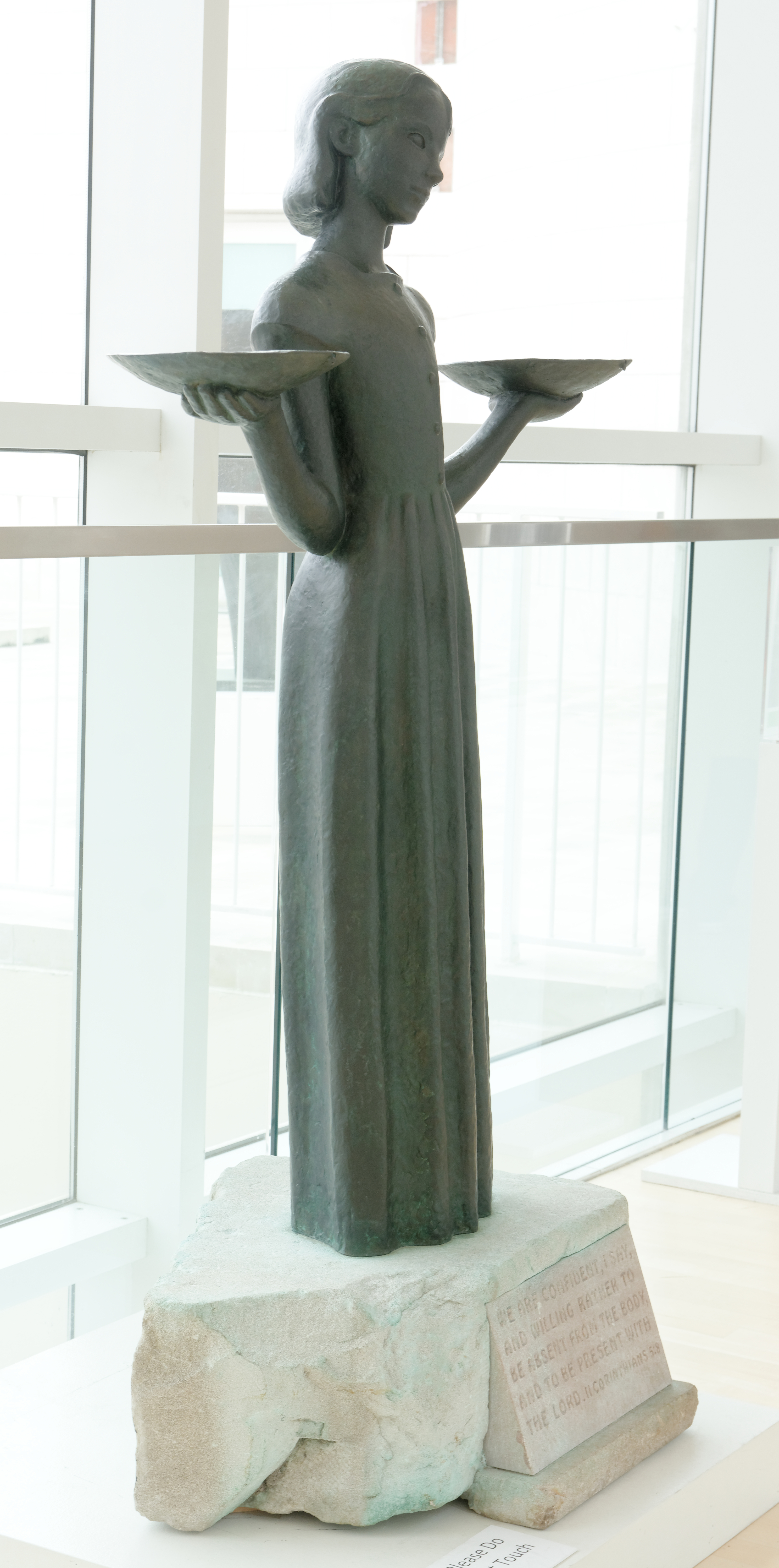 The Bird Girl statue, in the Telfair Jepson Museum in Savannah, Georgia, US (note that it is extremely backlit).  The statue was made in 1936 by Sylvia Shaw Judson.