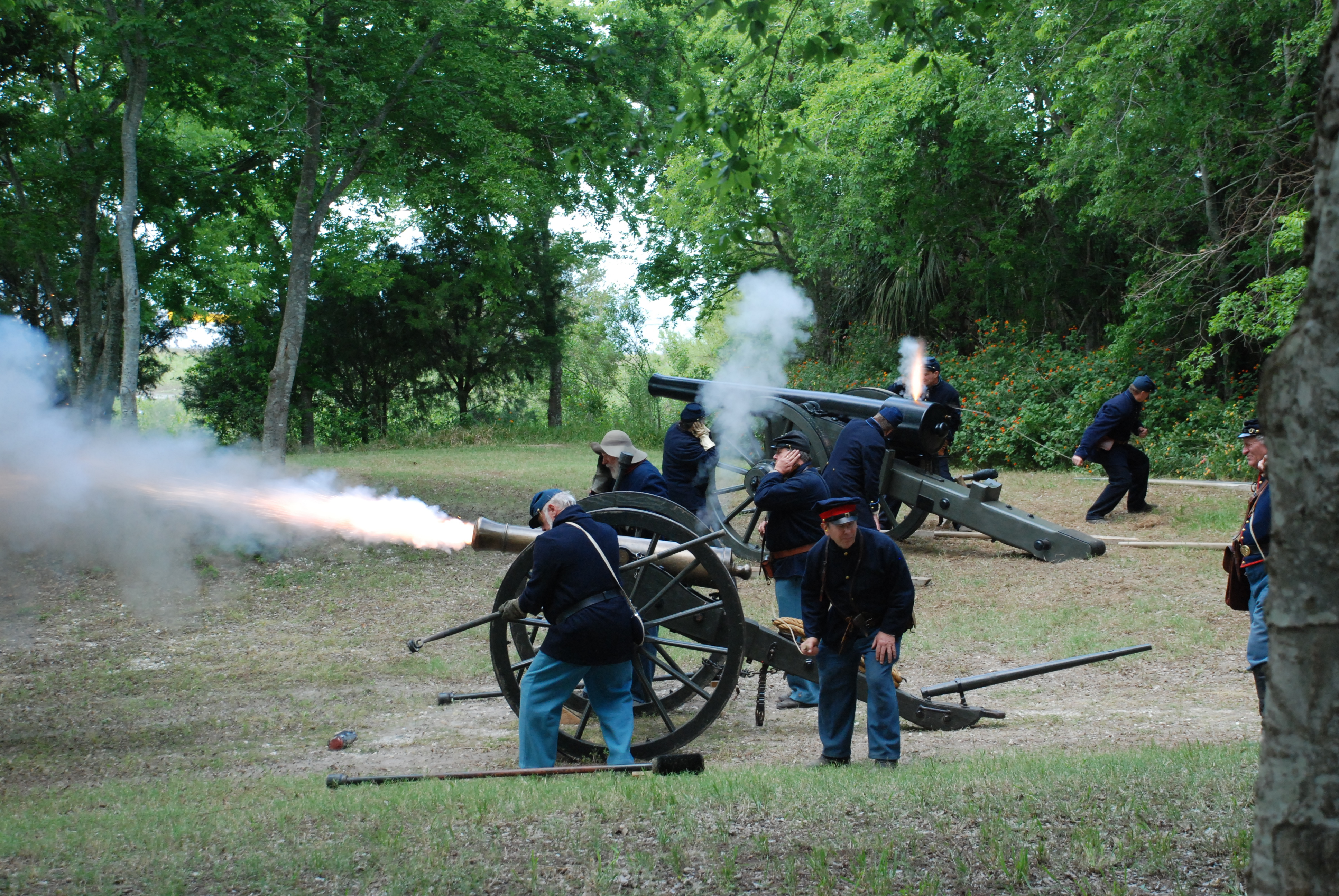 Men in uniform around two cannons. One cannon has smoke and flames coming out of it.
Reenactors reenacting the Siege of Fort Pulaski from Tybee Island for the 150th anniversary.
Keywords: canon; artillery; Fort Pulaski; Fort Pulaski National Monument; Siege of Fort Pulaski; reenactors