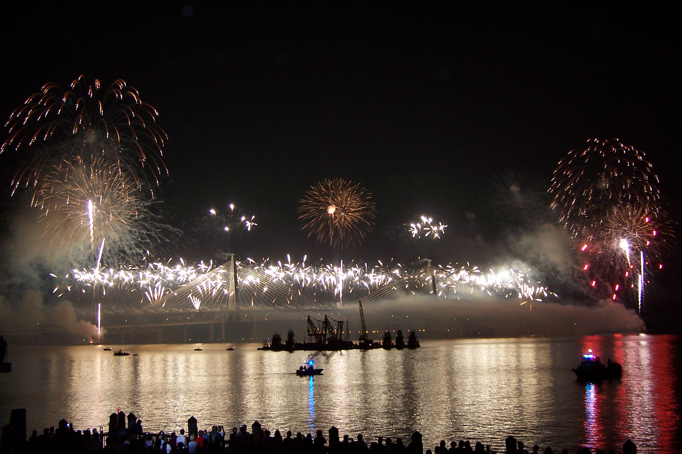 The fireworks display that preceded the opening of the Arthur Ravenel Bridge in Charleston, SC, USA, in July 2005. The bridge links the cities of Charleston and Mt. Pleasant that are separated by the Cooper River.