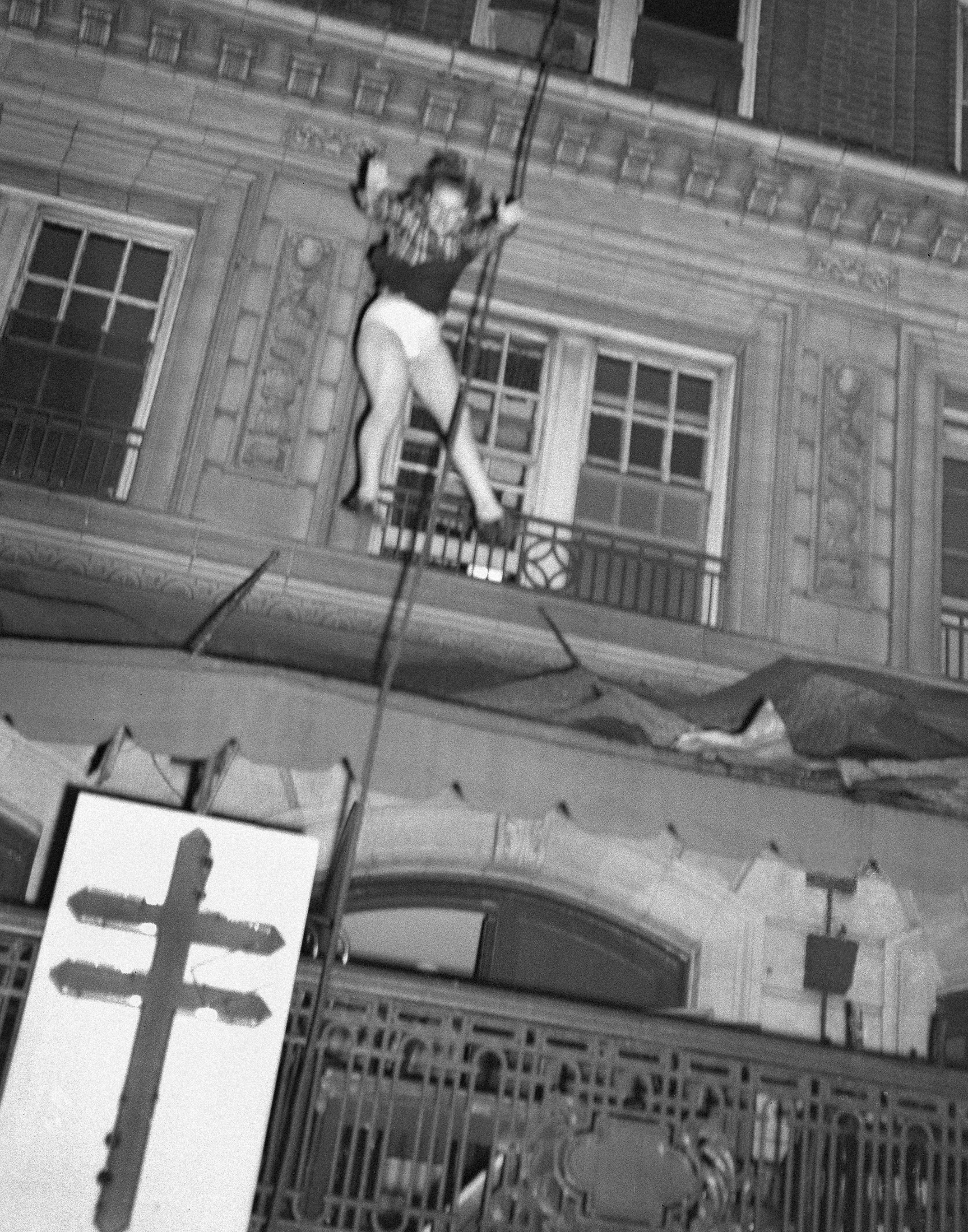 Daisy McCumber falls after leaping from a window to escape the Winecoff Hotel fire. This photograph won the 1947 Pulitzer Prize for Photography.