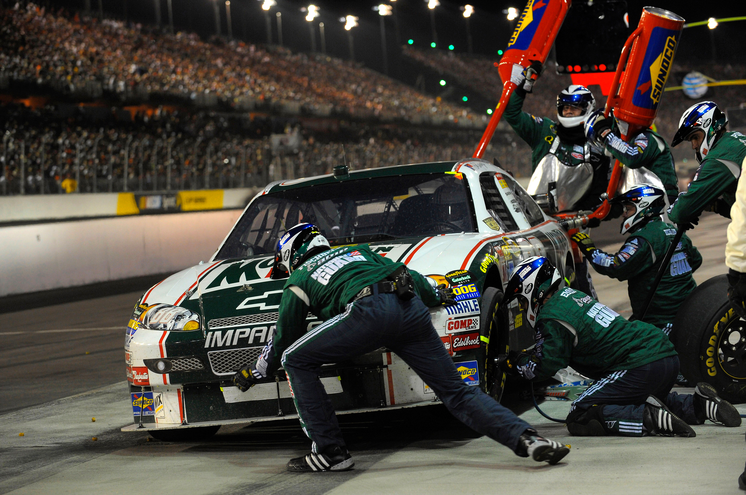 Dale Earnhardt, Jr. on pit road, as his team completes a pit stop during the 2008 Dodge Challenger 500 at Darlington Raceway on May 10, 2008.