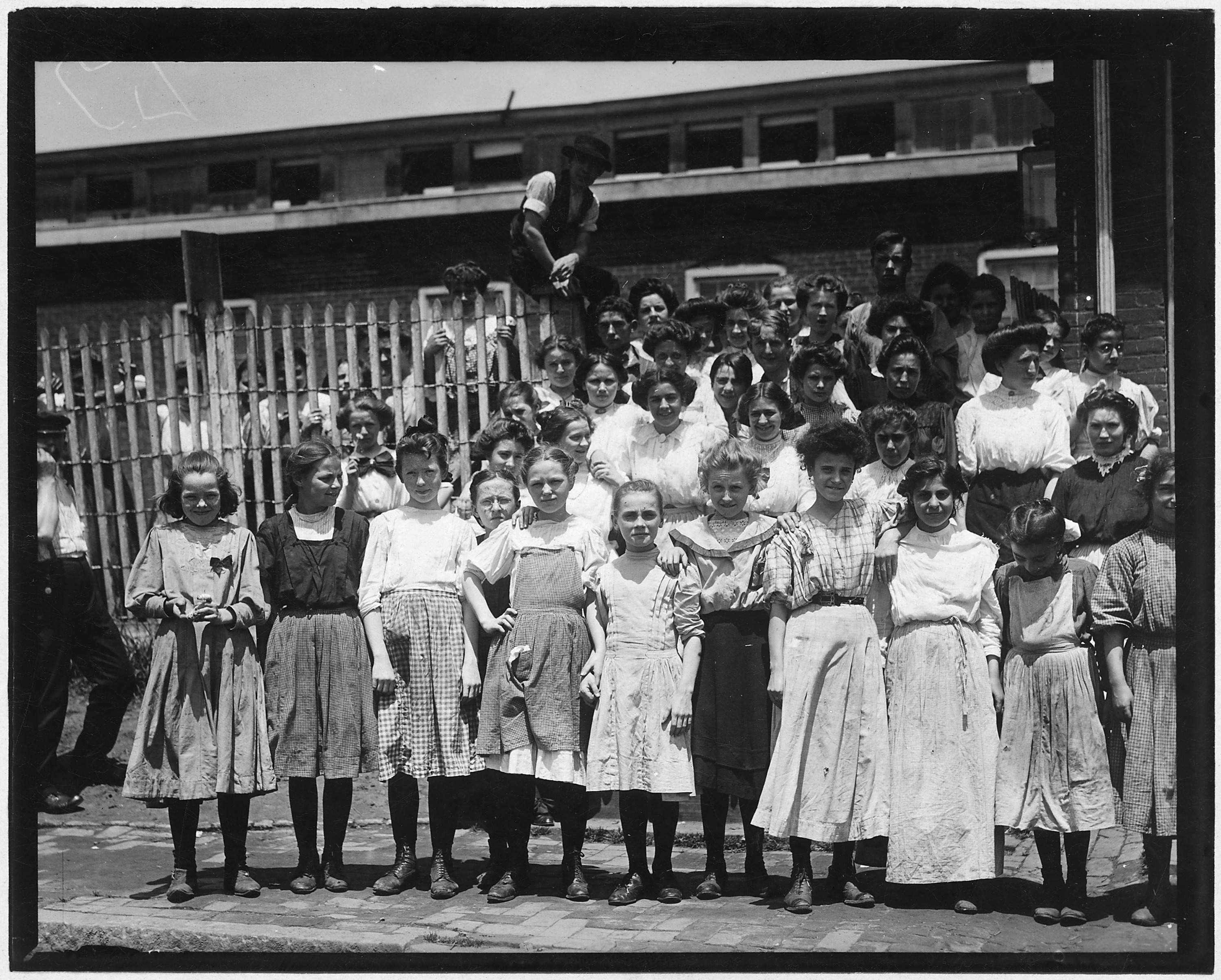 Group of girl workers at the gate of the American Tobacco Co. Young girls obviously under 14 years of age, who work... - NARA - 523314.jpg