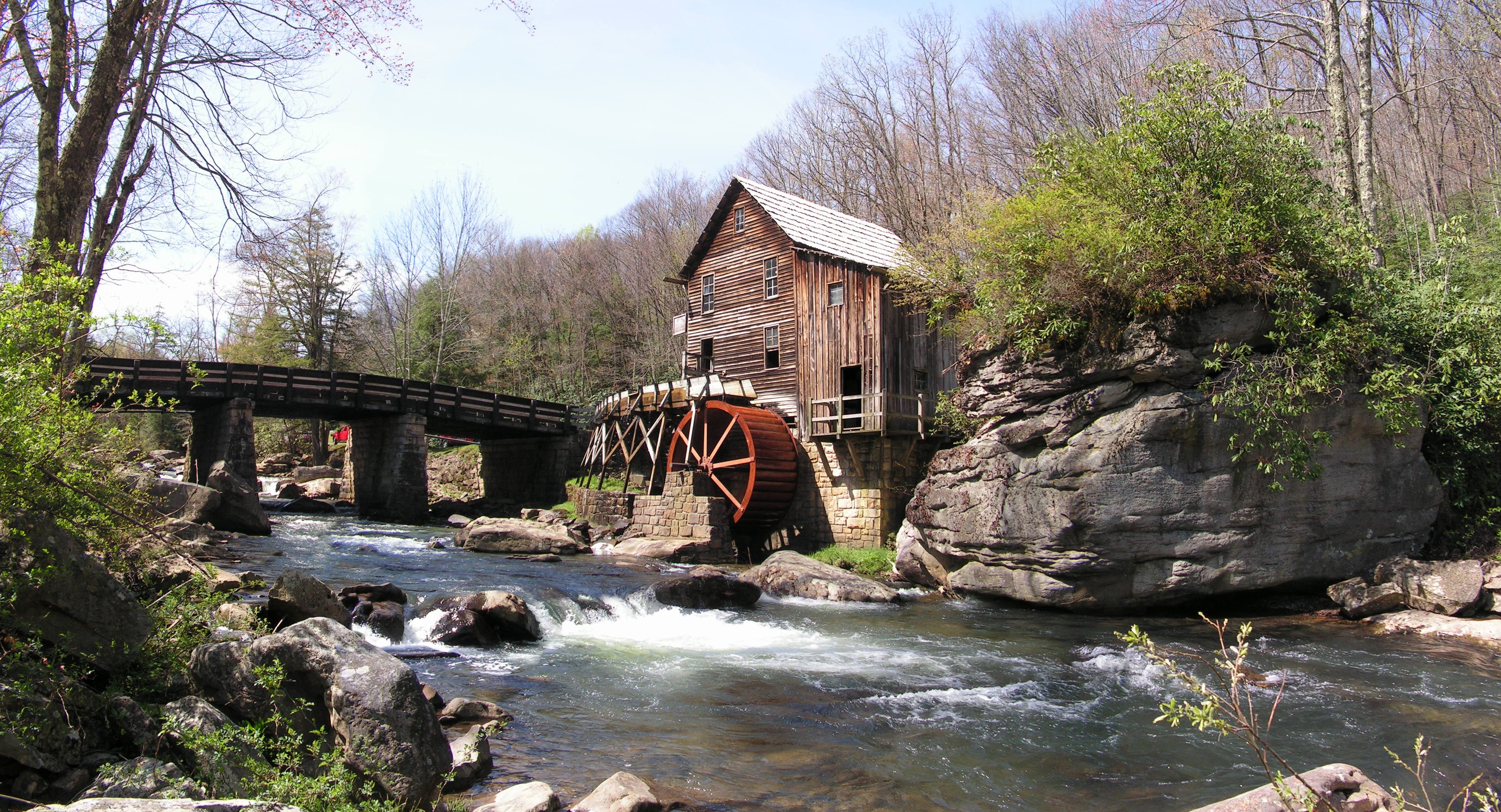 The Glade Creek Grist Mill, an iconic West Virginia attraction in Babcock State Park, WV, USA.
This semi-panorama was assembled from six separate parts, each taken with the same aperture and shutter settings for maximum compatibility. I used Paint Shop Pro 8, my graphic tablet, and my favorite method of erasing the layers into each other for assembly. The EXIF tag is a mockup from the bottom central picture, but most of the info should be correct, except for the image size.