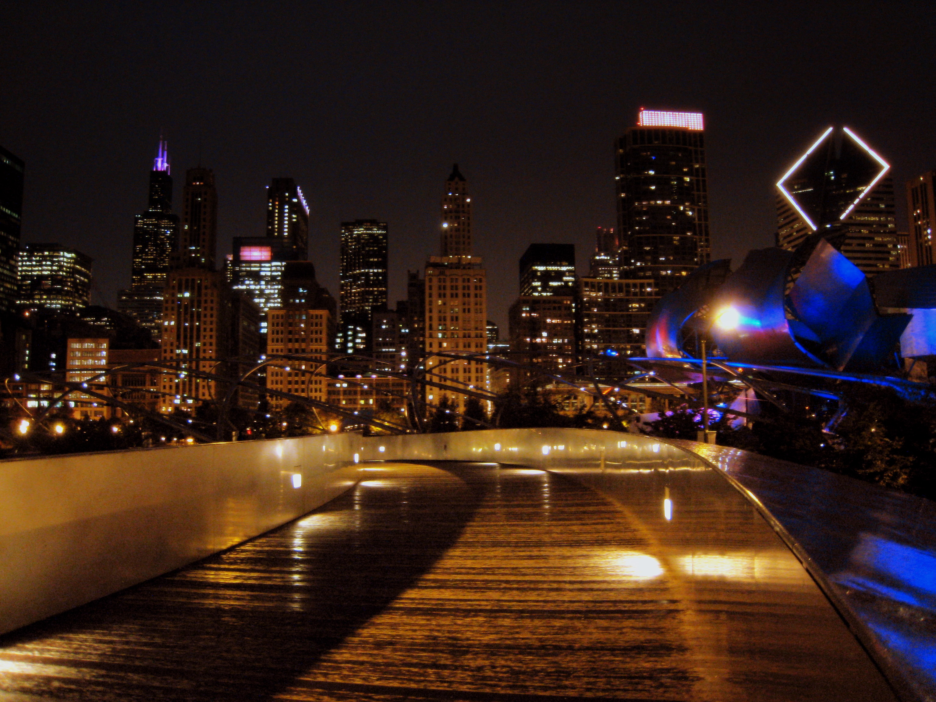 Chicago Skyline from Millenium Park. Shot from the BP Bridge over the Pritzker Pavilion, Chicago.