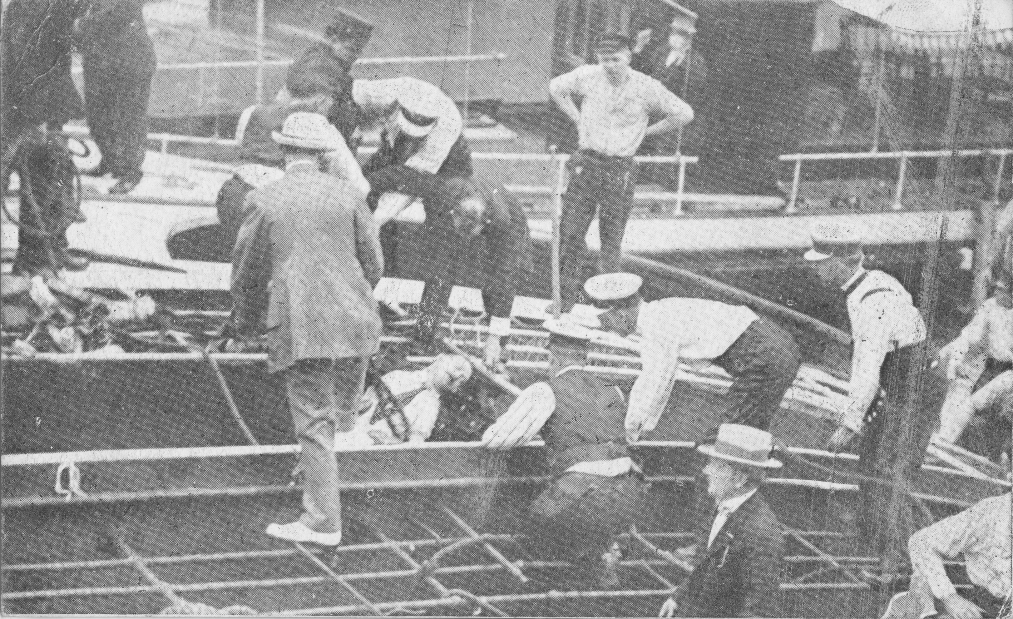 Police recover bodies from between decks of the capsized steamer Eastland