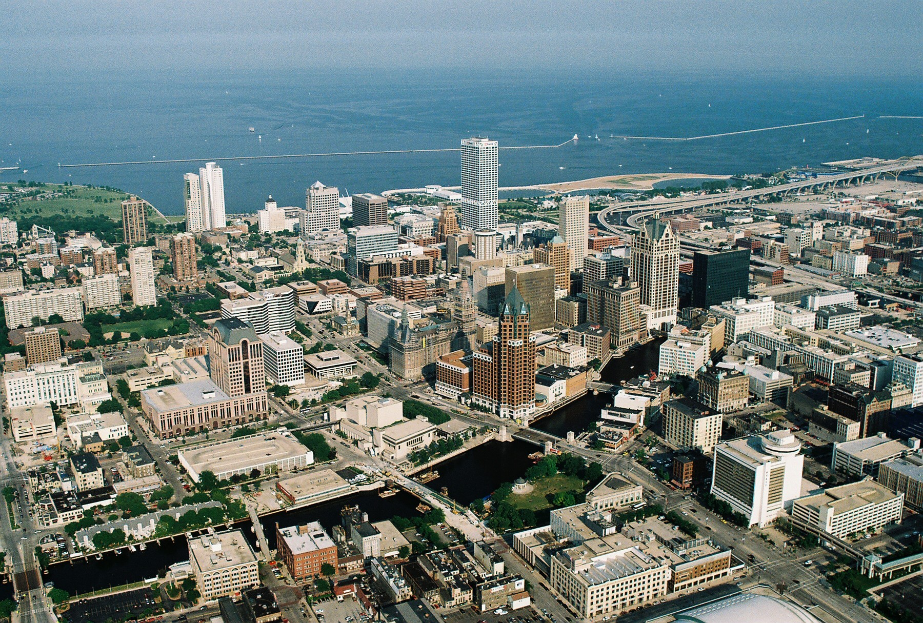 Aerial view of Milwaukee Downtown with Lake Michigan in the background and Milwaukee River in the foreground, Wisconsin, USA.