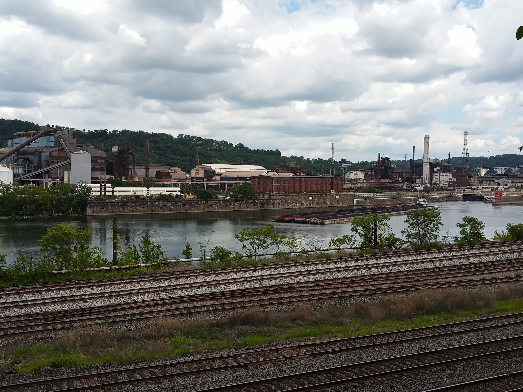 This image shows the Edgar Thomson steel works, including the two blast furnaces and BOP shop from across the Monongahela River.