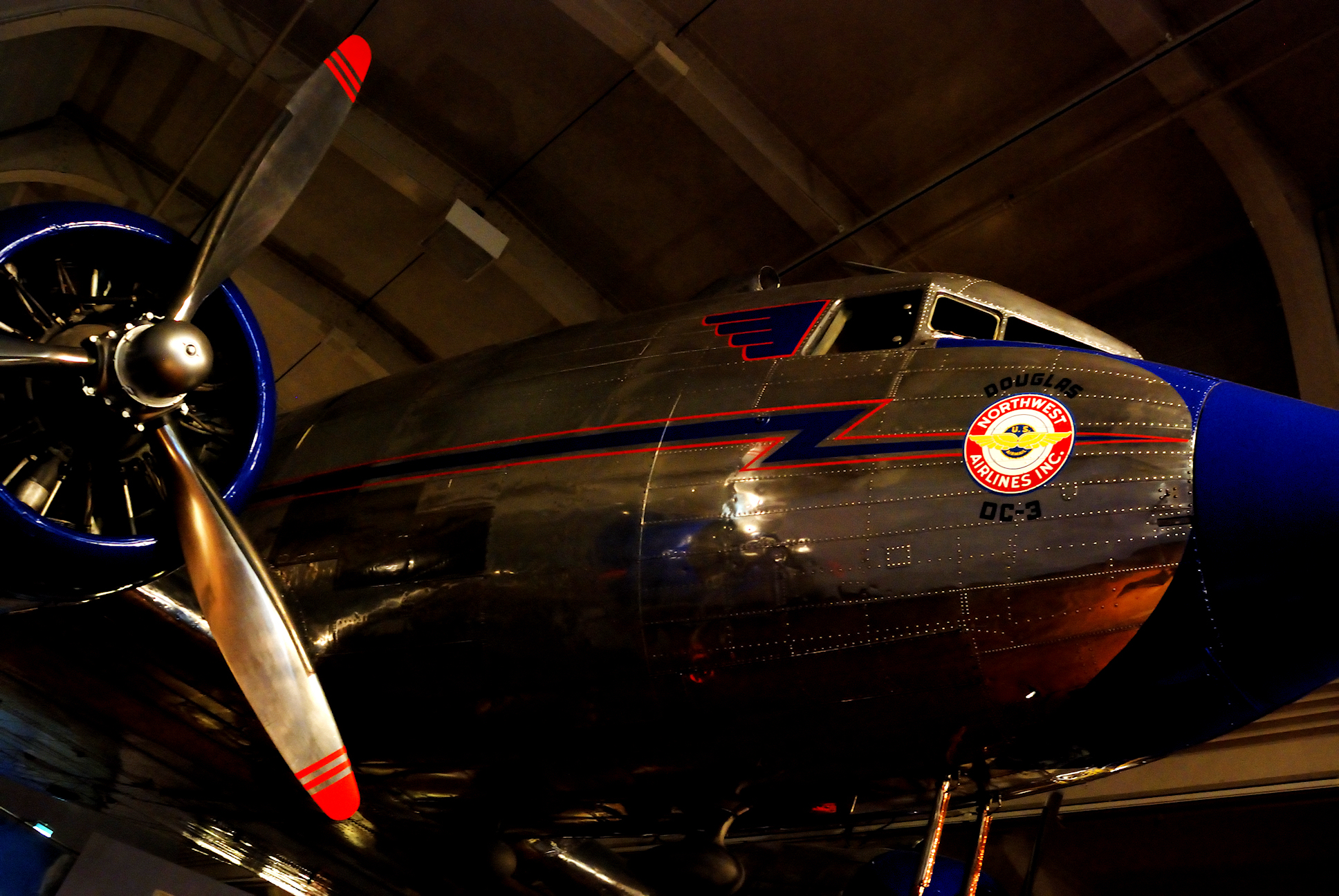 Douglas DC-3 in The Henry Ford museum. Although it is now painted in the colors that Northwest Airlines used for its own DC-3s, this particular DC-3 never flew for Northwest. It was originally bought by Eastern Air Lines in 1939. After a 13-year career with Eastern, it was sold to North Central Airlines in 1952, who used it first as an airliner and later as an executive transport. It then passed to North Central's successor Republic Airlines, which eventually was merged into Northwest. After the museum acquired the aircraft, Northwest paid for its restoration, so it was repainted in the colors used by Northwest DC-3s. At one time "728" (so dubbed for its U.S. registration NC21728) was the highest-flight-time DC-3 in the world.
