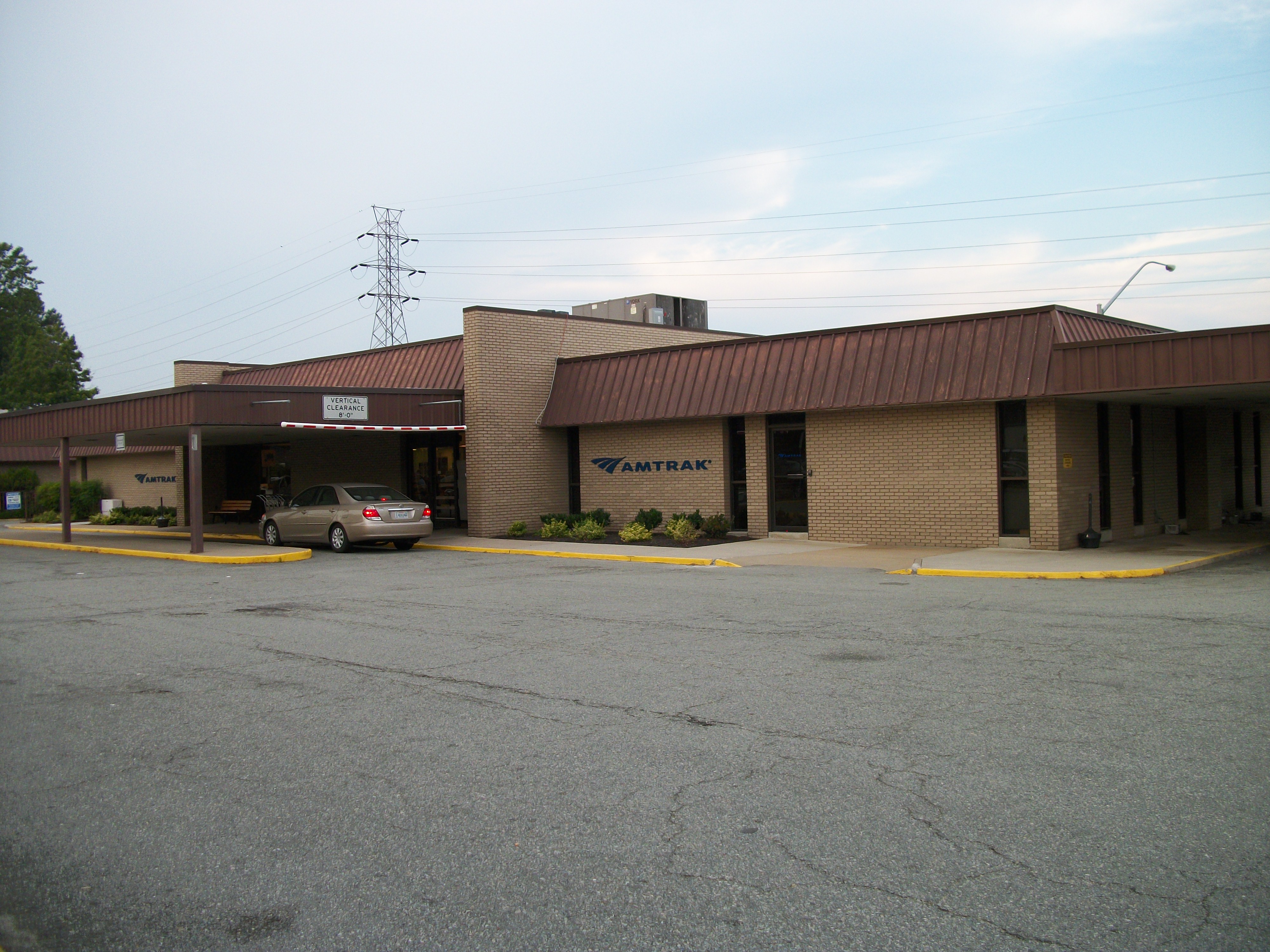 A shot of the Amtrak Station at Staples Mill Road near Richmond, Virginia. I had to park two parking lots away to take this shot, because the parking lot requires a ticket to enter by car, and is protected by a booth.