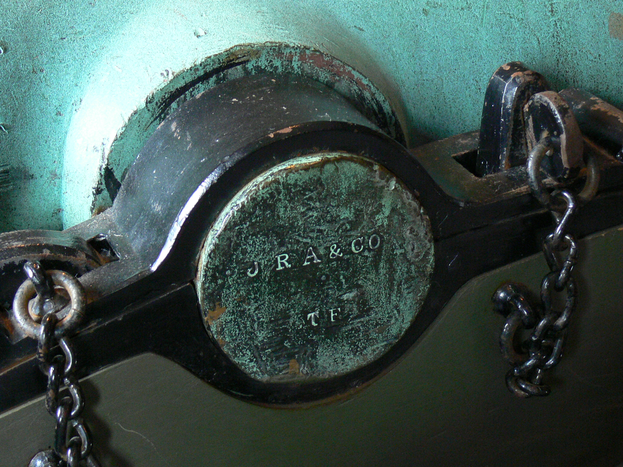 Trunnion marked "JRA&amp;Co TF" (J.R. Anderson &amp; Co, Tredegar Foundry); from a bronze cannon made by the Tredegar Iron Works in Richmond, Virginia, on display at Historic Tredegar.