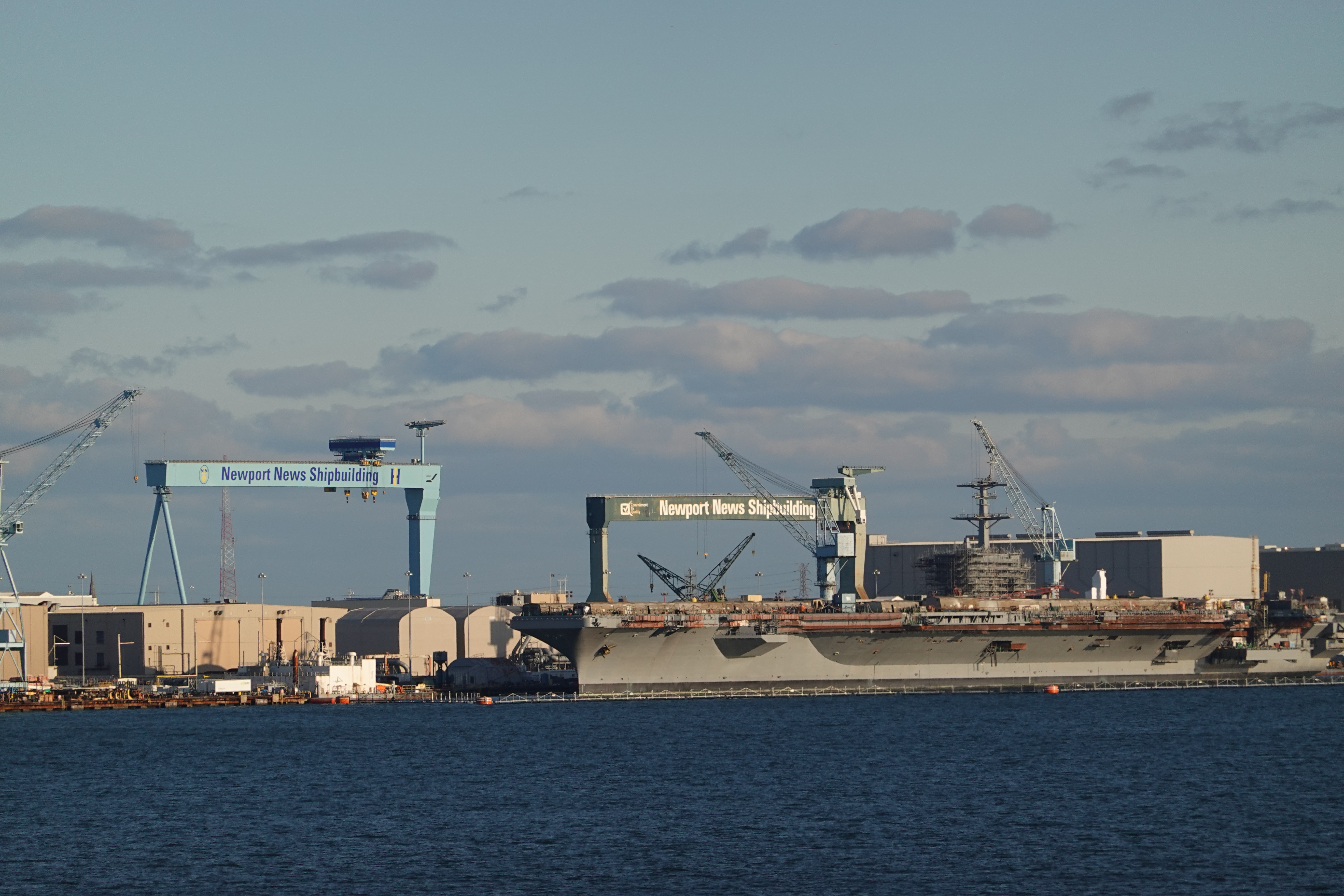 Cranes of Newport News Shipbuilding seen from the James River Bridge, 2020