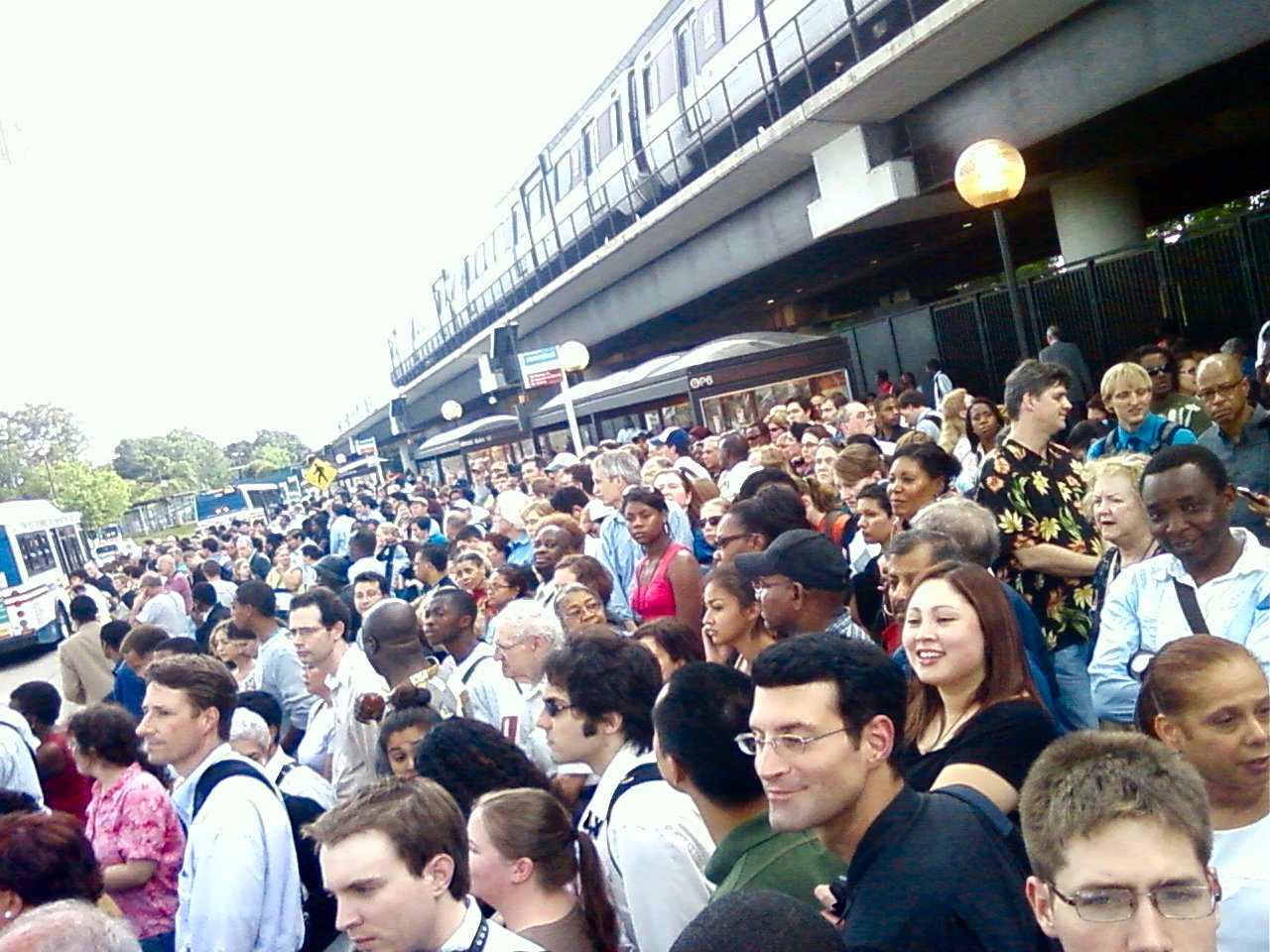 Rush hour crowds attempting to catch shuttle buses at Rhode Island Avenue, following the 2009 Washington Metro train collision.