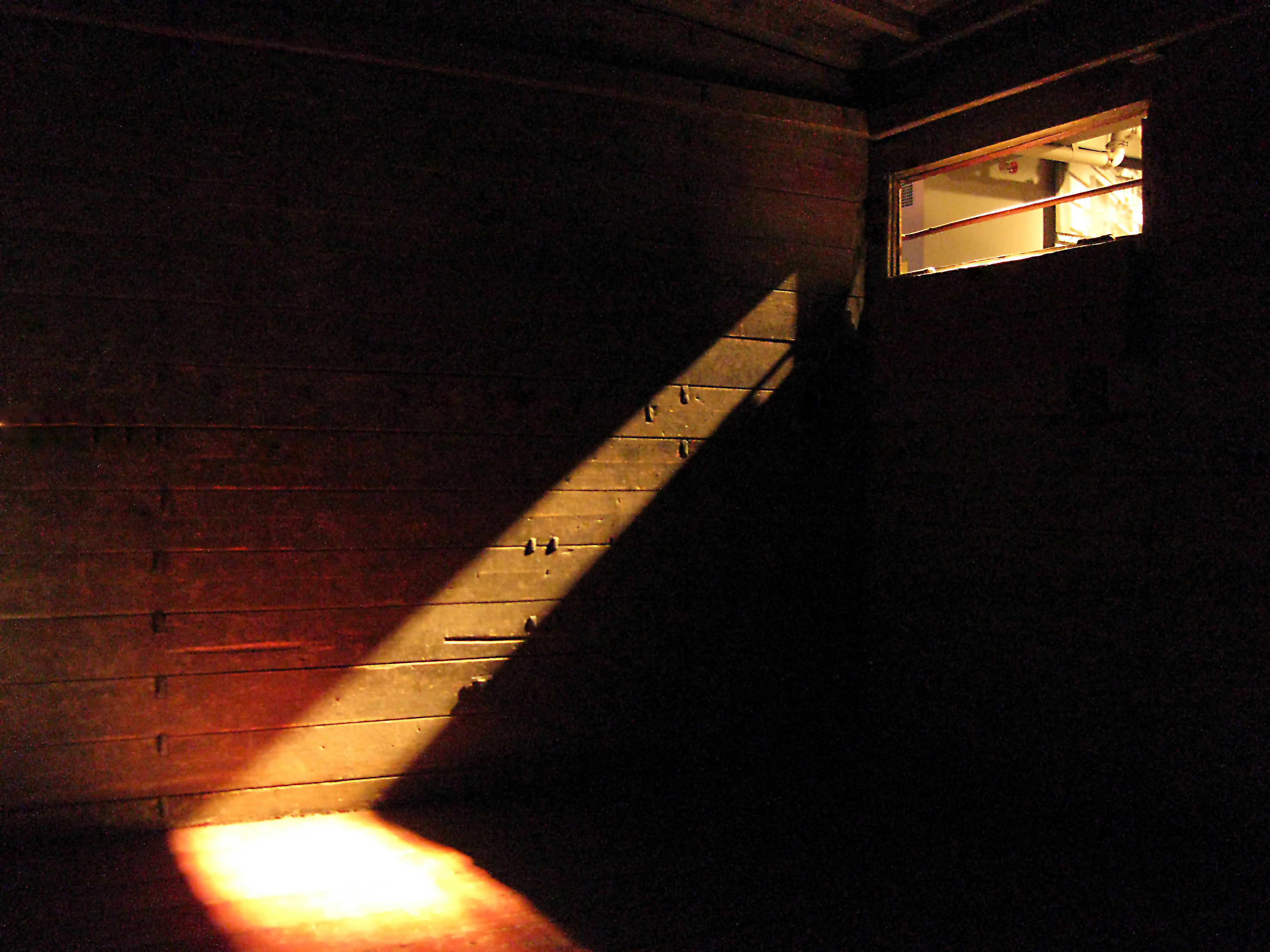 Interior of a Holocaust train boxcar used by Nazi Germany to transport Jews and other victims during World War II. The boxcar is located inside the United States Holocaust Memorial Museum in Washington, D.C.