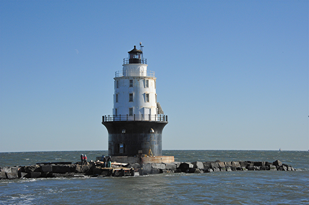 DELAWARE — The U.S. Army Corps of Engineers' Philadelphia District recently completed repairs to the Harbor of Refuge breakwater. The breakwater and the historic lighthouse that sit on top are listed in the National Register of Historic Place.
The $2.6 million repair project involved placing 91 capstones, filling voids and pouring concrete. Reilly Construction Inc. and R.E. Pierson Construction Co. served as the contractors. (U.S. Army Corps of Engineers photo)