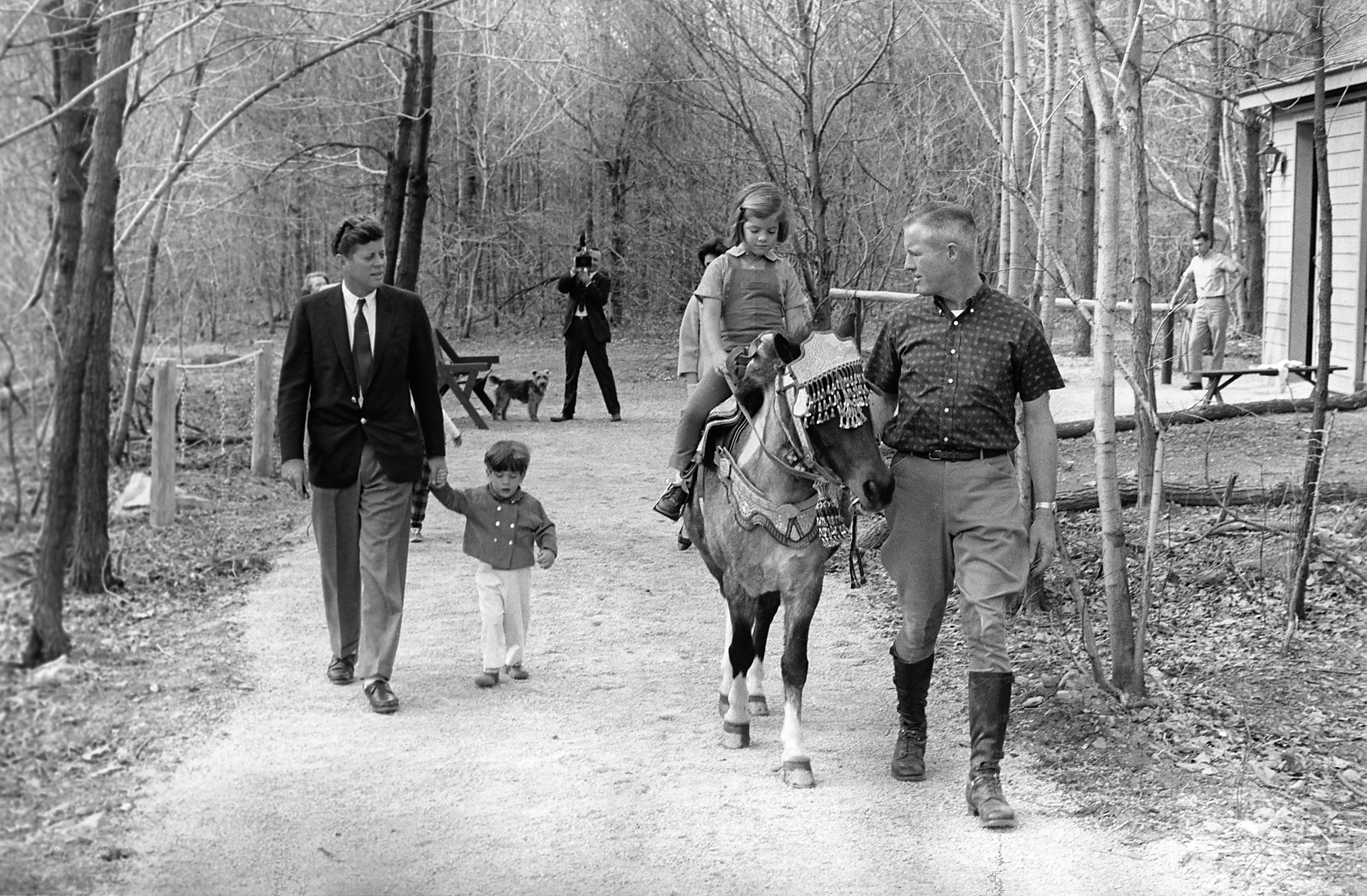 Weekend at Camp David. President Kennedy, John F. Kennedy, Jr., Caroline Kennedy ( riding "Tex" ). Camp David, MD.
