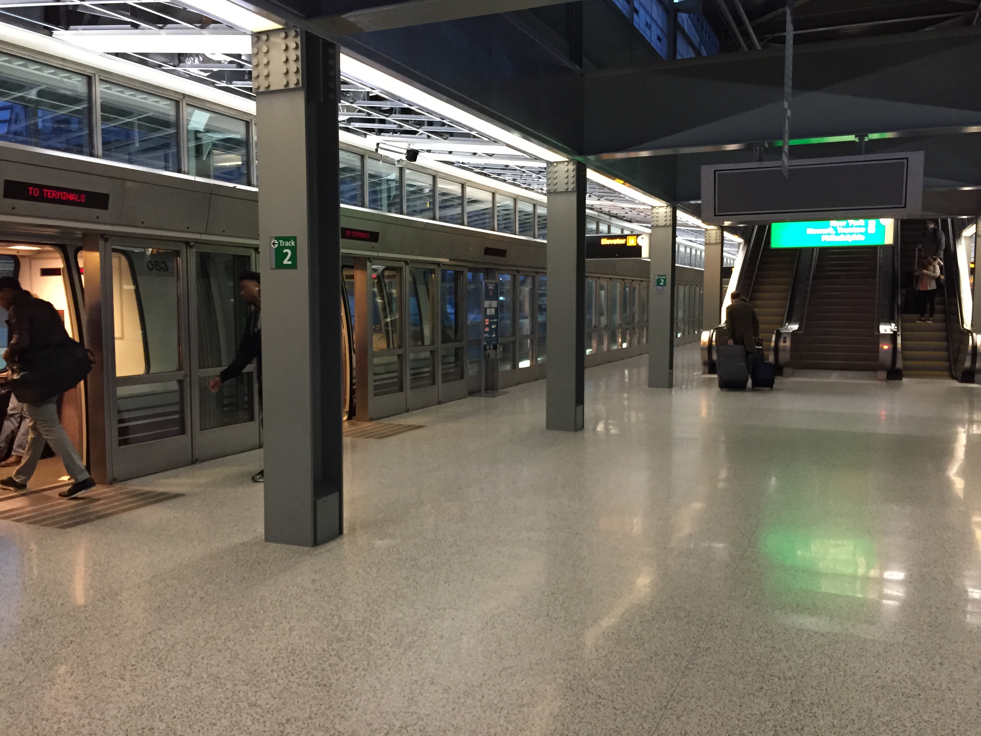 Passengers boarding AirTrain Newark at the NJ Transit Newark Liberty International Airport Rail Station, New Jersey