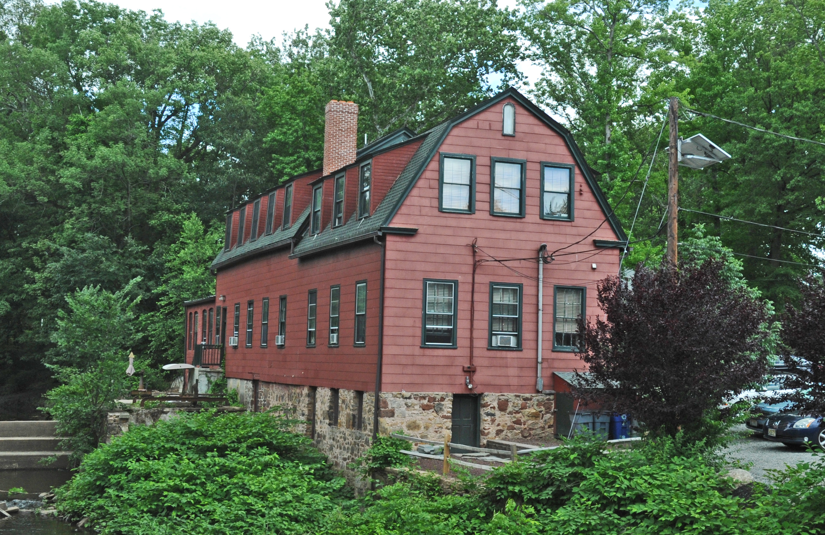 ORIGINAL SAWMILL BUILT BY BENJAMIN WILLIAMS CIRCA 1737 BUT THE PRESENT STRUCTURE PROBABLY DATES FROM CIRCA 1814.  HAS NOW BEEN CONVERTED INTO OFFICES MAINLY MEDICAL SERVICES RELATED.  LOCATED ON THE RAHWAY RIVER