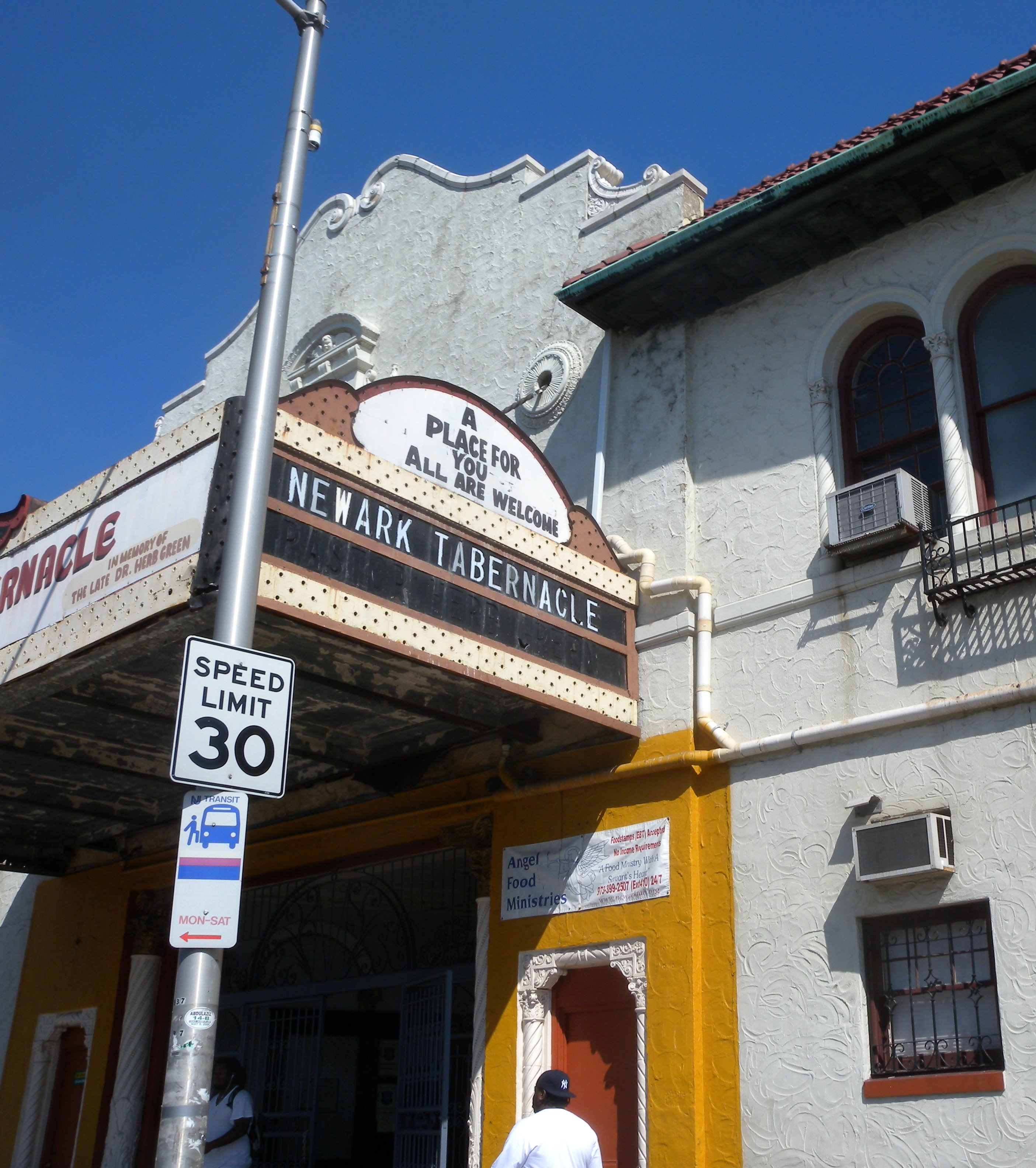 Looking northwest from South Orange Avenue at former Stanley Theater on a sunny morning.