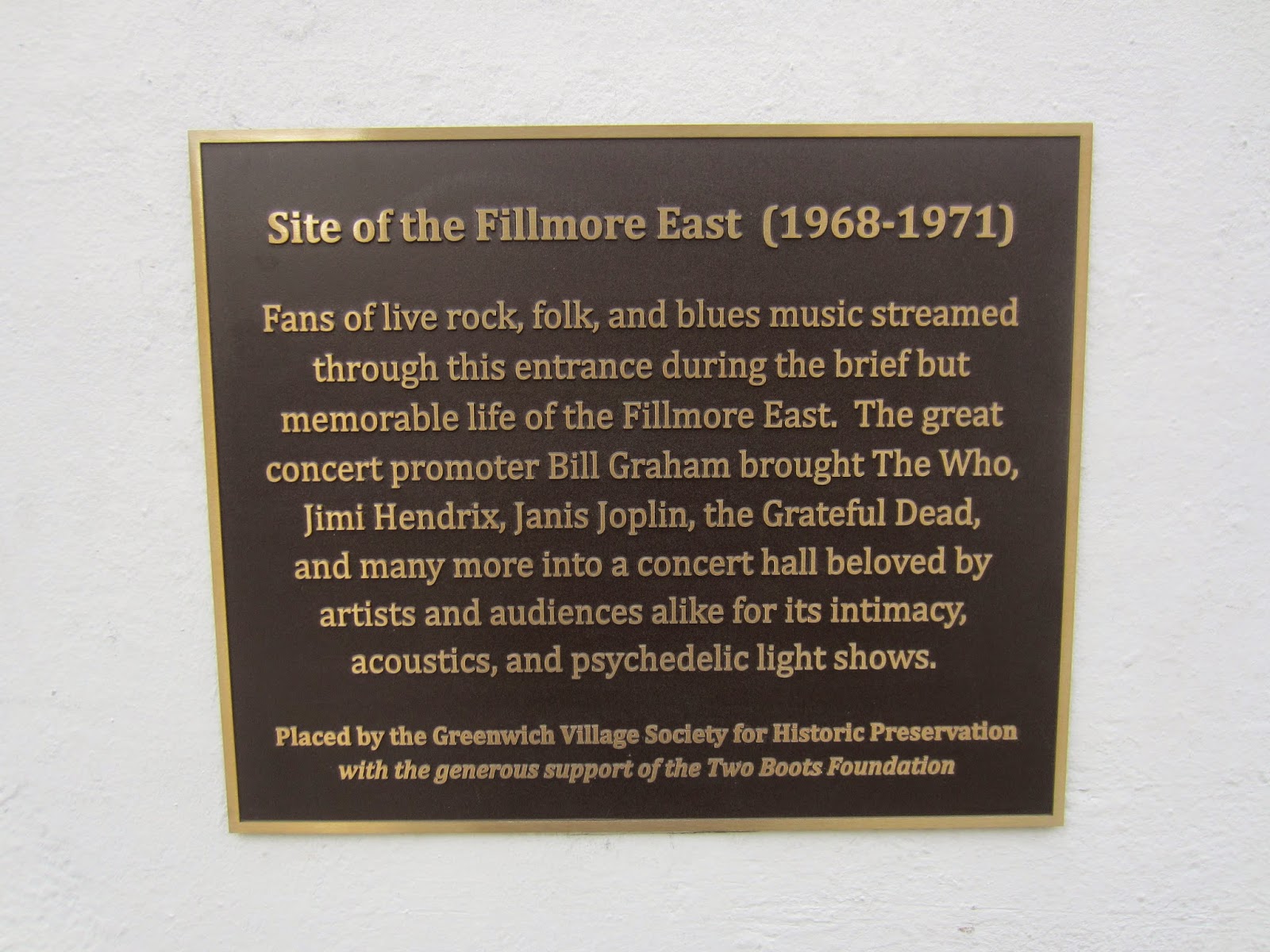 Unveiled on October 29, 2015 by Greenwich Village Society for Historic PreservationText of Plaque with line breaks as they appear:

Site of the Fillmore East (1968-1971)
Fans of live rock, folk, and blues music streamed
through this entrance during the brief but
memorable life of the Fillmore East. The great
concert promoter Bill Graham brought The Who,
Jimi Hendrix, Janis Joplin, the Grateful Dead,
and many more into a concert hall beloved by
artists and audiences alike for its intimacy,
acoustics, and psychedelic light shows.

Placed by the Greenwich Village Society for Historic Preservation
with the generous support of the Two Boots Foundation