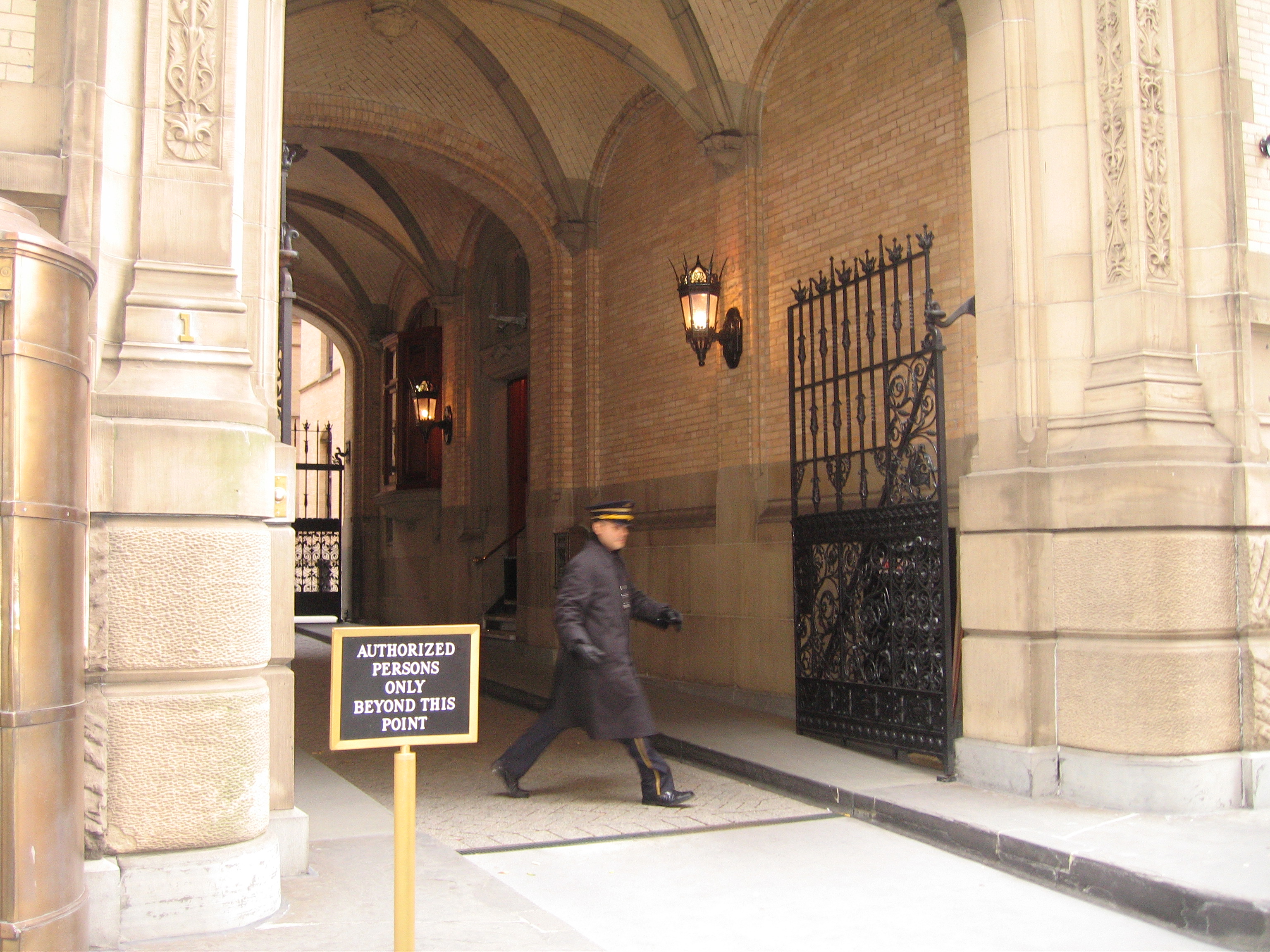 Photo of the entryway to the Dakota Apartments.  Side view, showing the steps to the lobby that John Lennon walked up before he collapsed, 8 Dec. 1980.