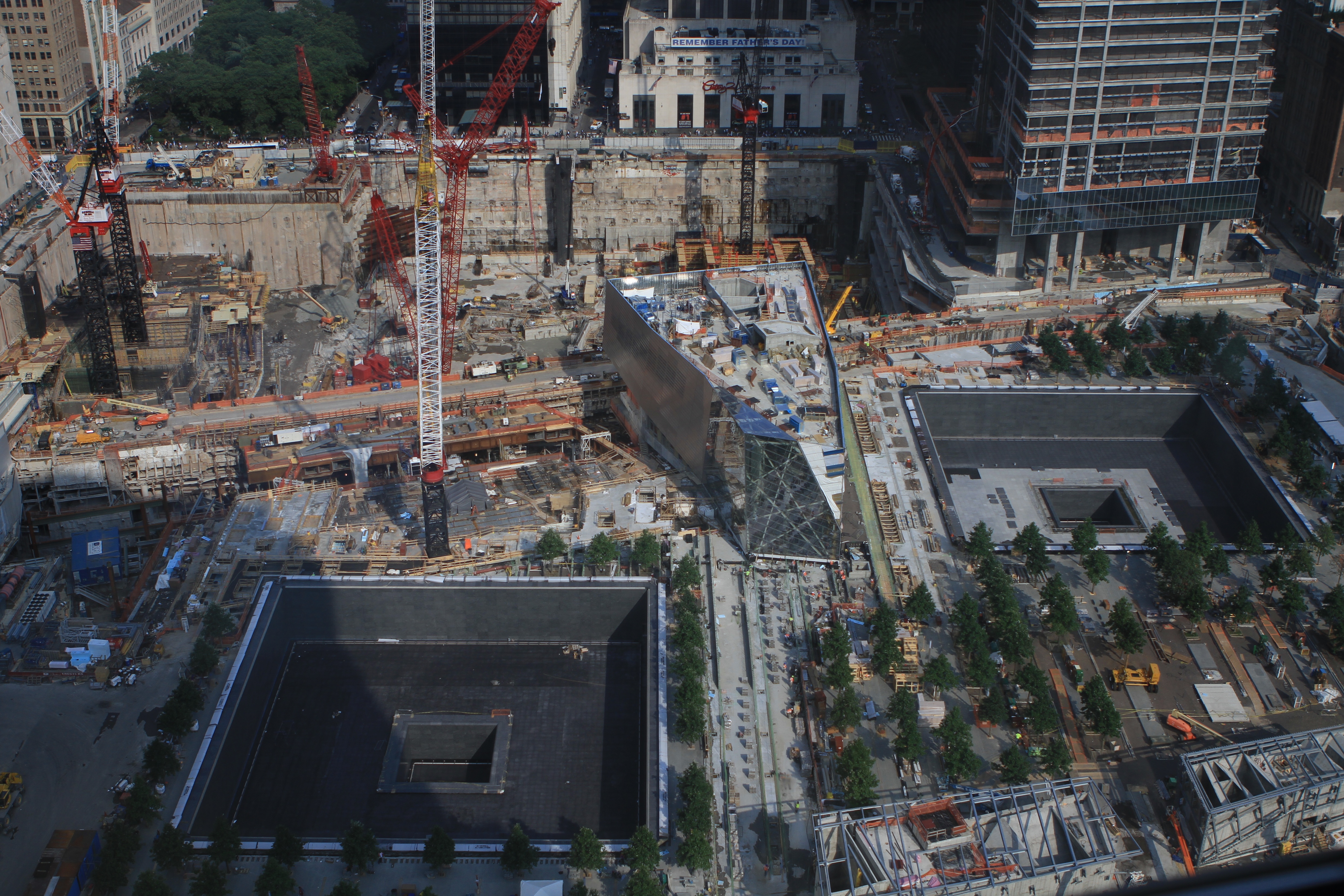 The Ground Zero construction site, seen from across the West Side Highway and thirty floors up. The two pools, lined with waterfalls, mark the footprints of the original 1 WTC and 2 WTC; the new 1 WTC is out of shot to the left.