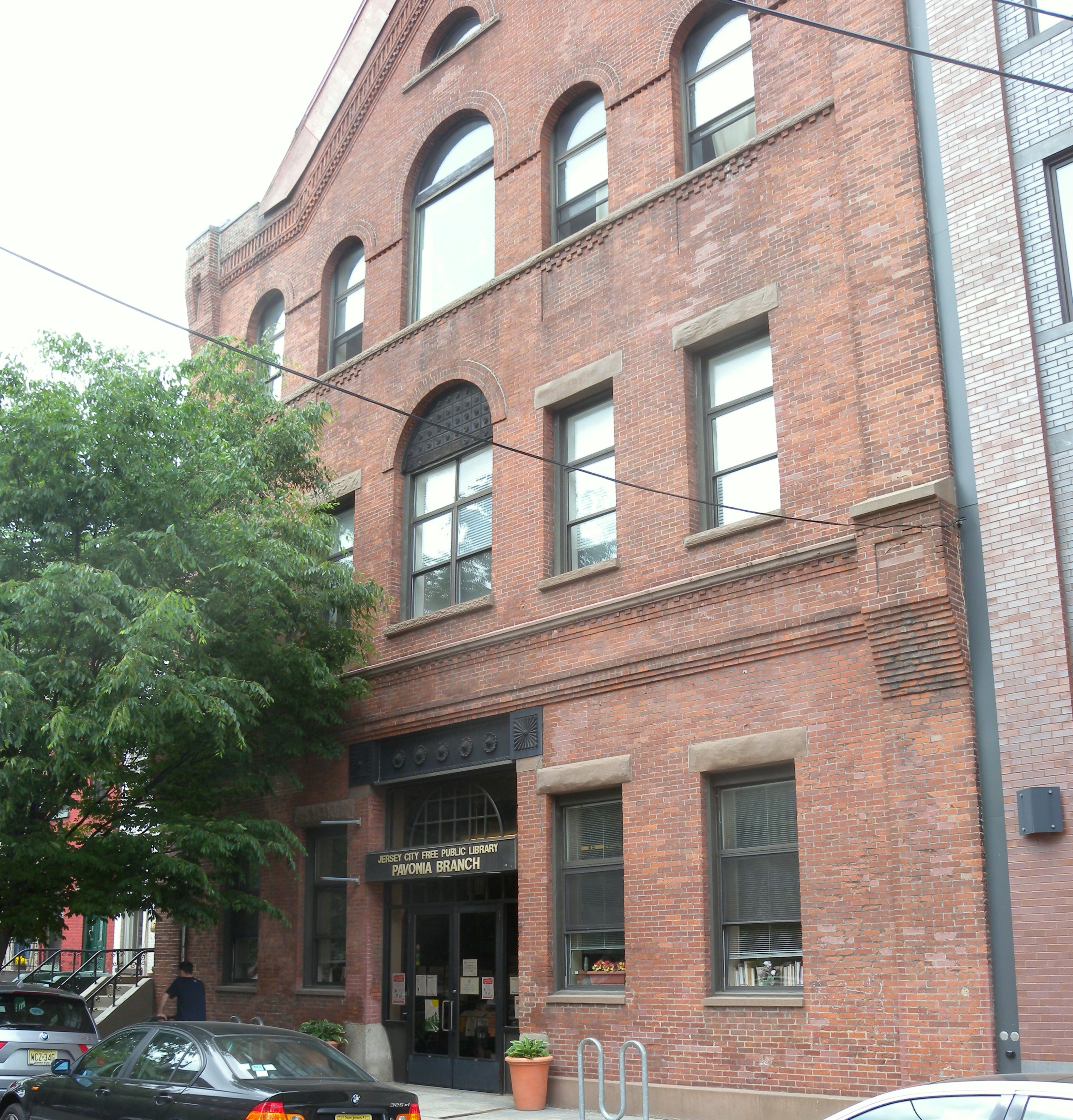 Looking north at Pavonia Branch, JC Free Public Library on a cloudy afternoon.  Google Earth Street View in former years mistakenly showed a picture of JFK Boulevard.
