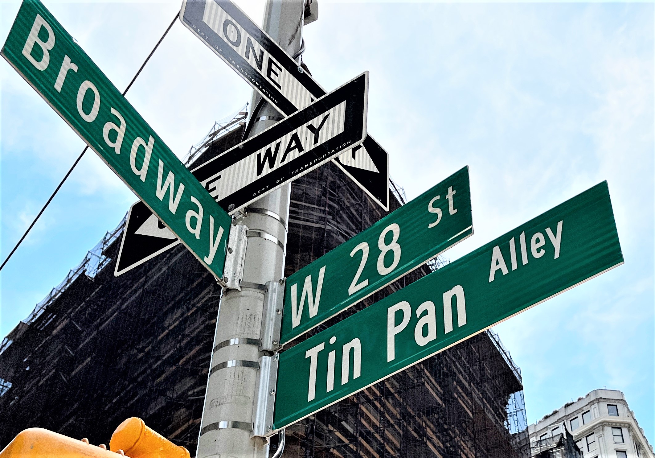 This street sign, unveiled in April 2022 on the corner of 28th Street and Broadway, acknowledges the area's history as "Tin Pan Alley", the home to many music publishers from the dawn of the 20th Century.
