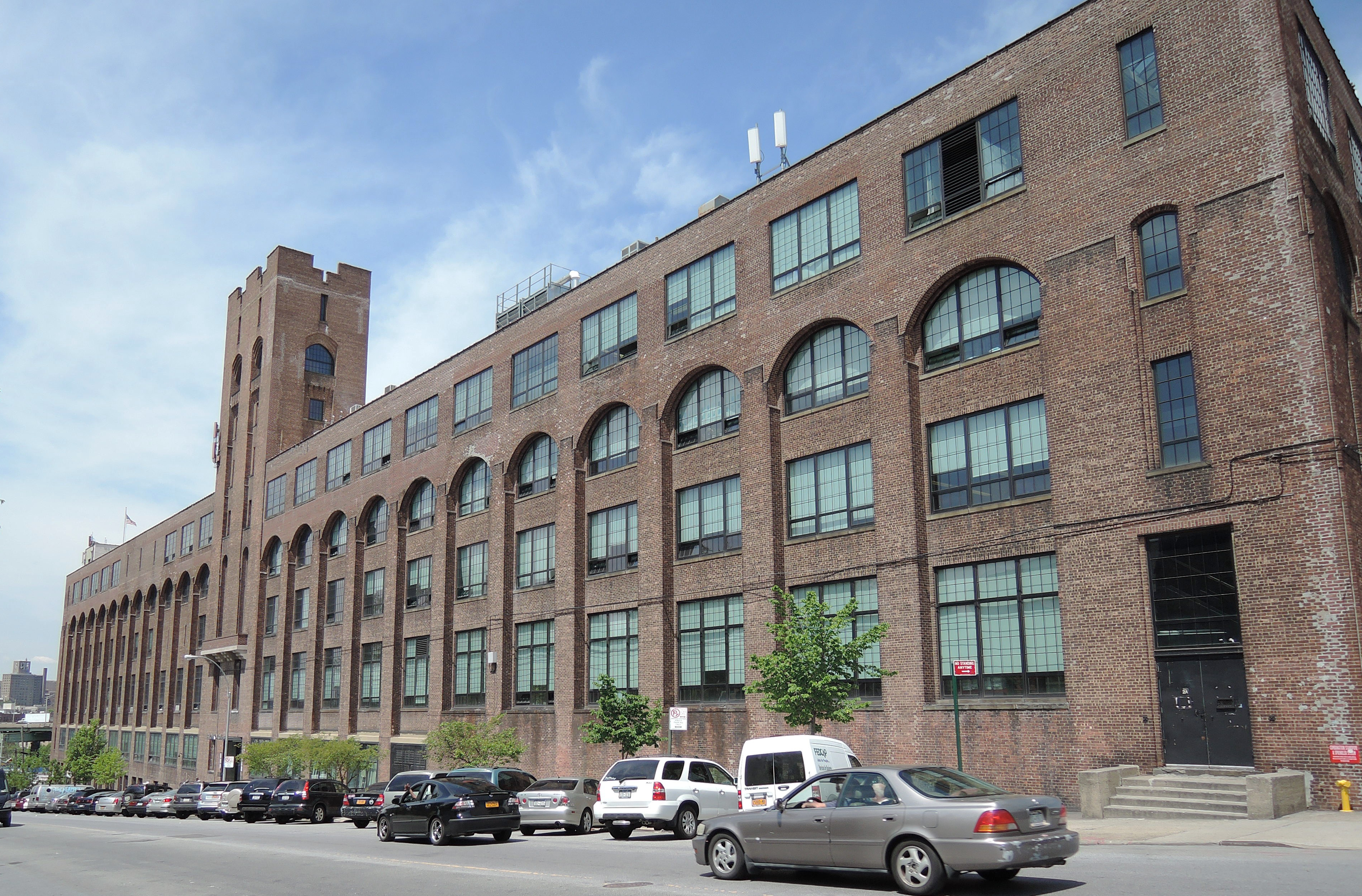 Looking northwest at former print plant in the Bronx, New York City, on a sunny midday.