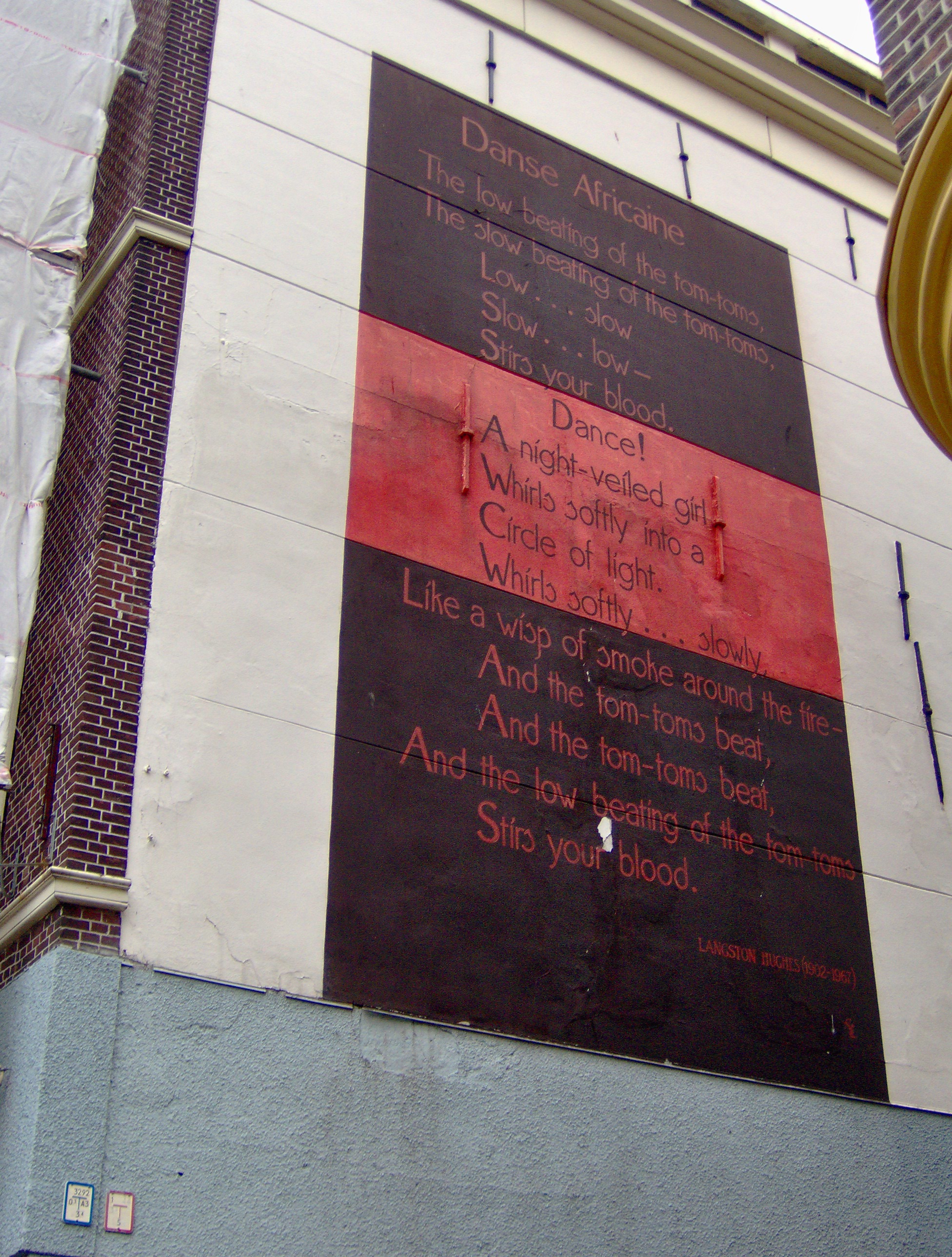 The poem Danse Africaine of the American poet Langston Hughes on a wall of the building at the Nieuwe Rijn 46, Leiden, The Netherlands