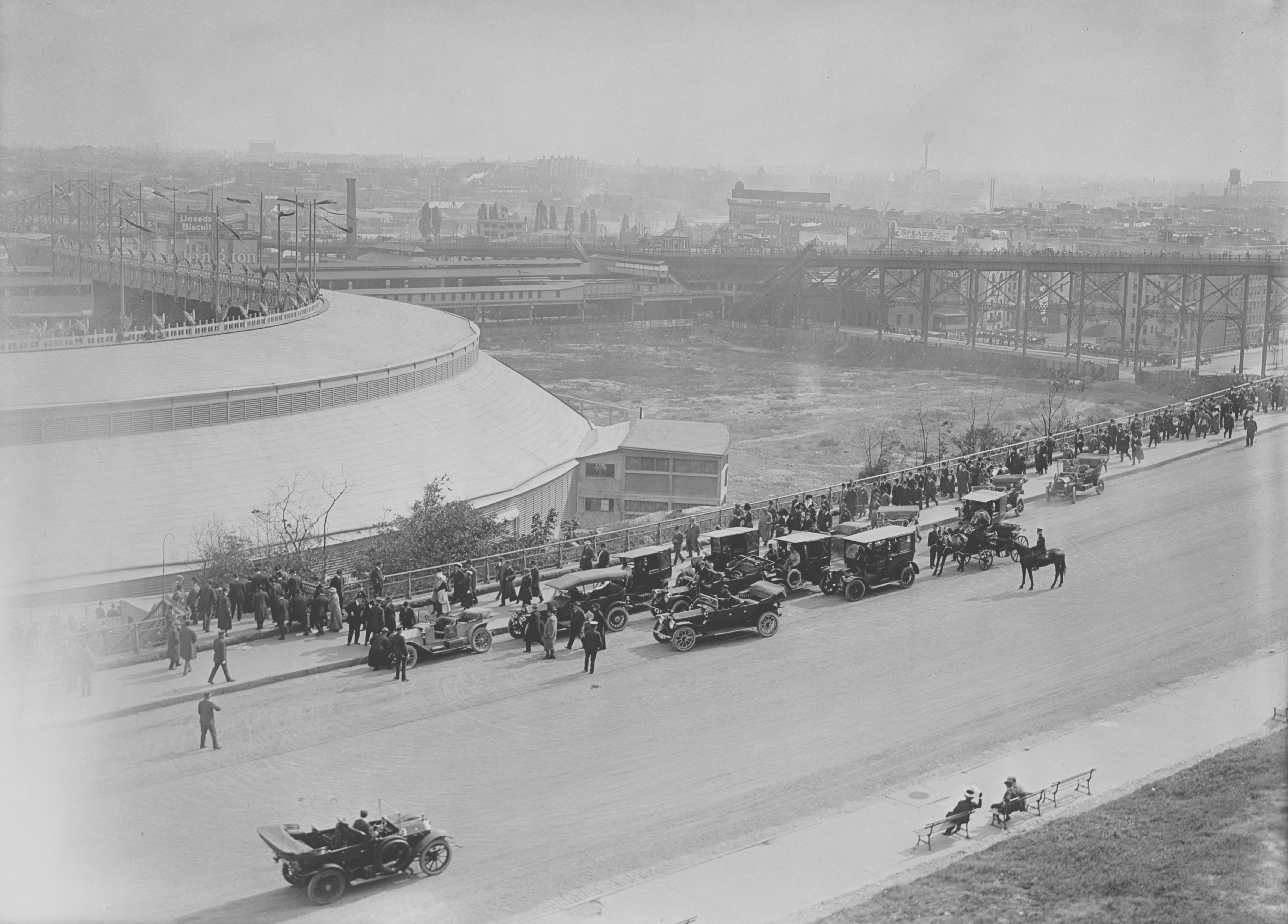 Outside of Polo Grounds with Harlem River Speedway in foreground, btw. 1910 and 1920.