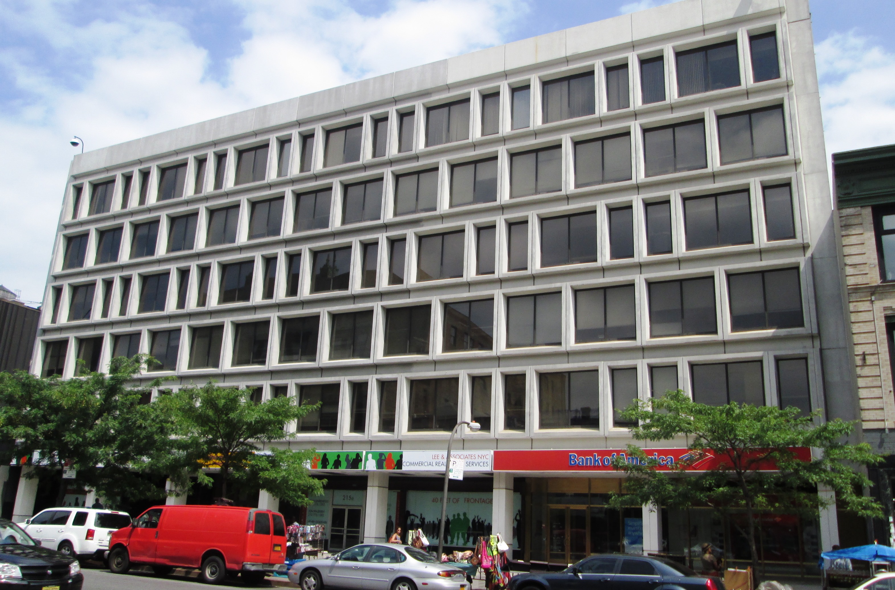 The Sydenham Hospital Clinic at 215 West 125th Street between Adam Clayton Powell Jr. Boulevard and Frederick Douglass Boulevard in the Harlem neighborhood of Manhattan, New York City, was built in 1971 as the Commonwealth Buildingand was designed by Hausman &amp; Rosenberg. (Source: AIA Guide to NYC (5th ed.))