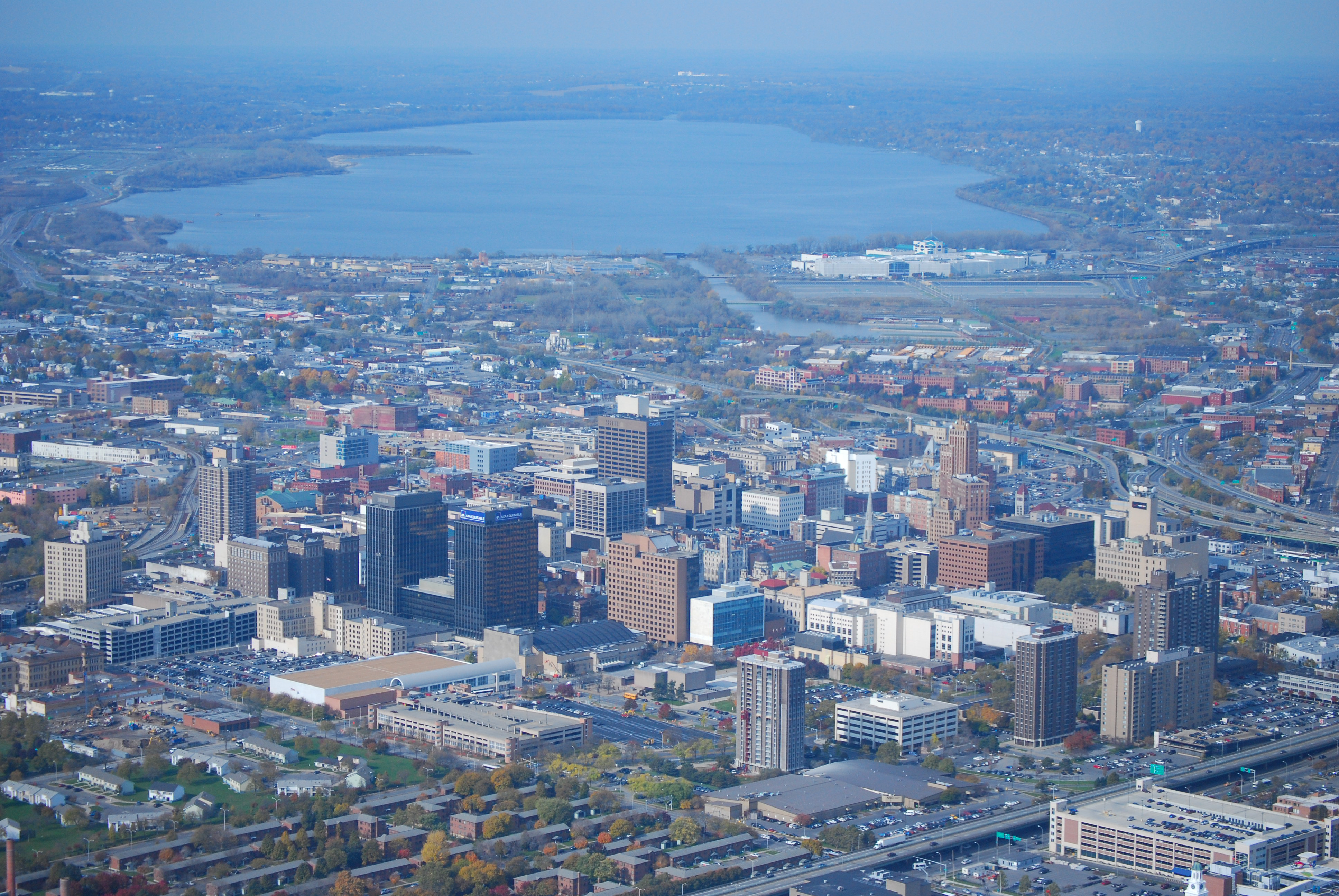 Downtown Syracuse, New York from helicopter. Onondaga Lake in background.