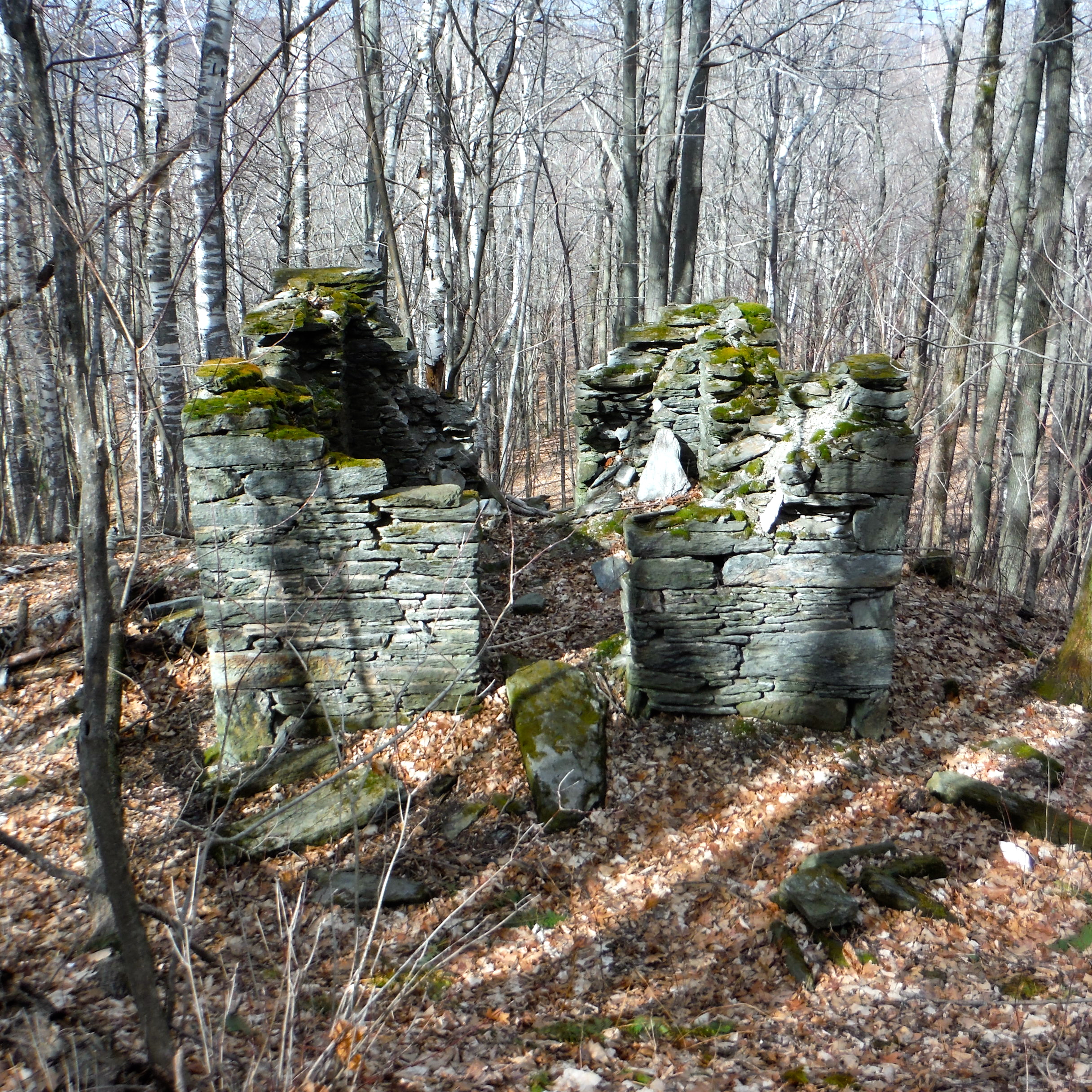 Ruins of the western most alignment tower located on Ragged Mountain in North Adams, Massachusetts. Located just off of abandoned West Mountain Road at the high of land as the road traverses the northern end of Ragged Mountain.