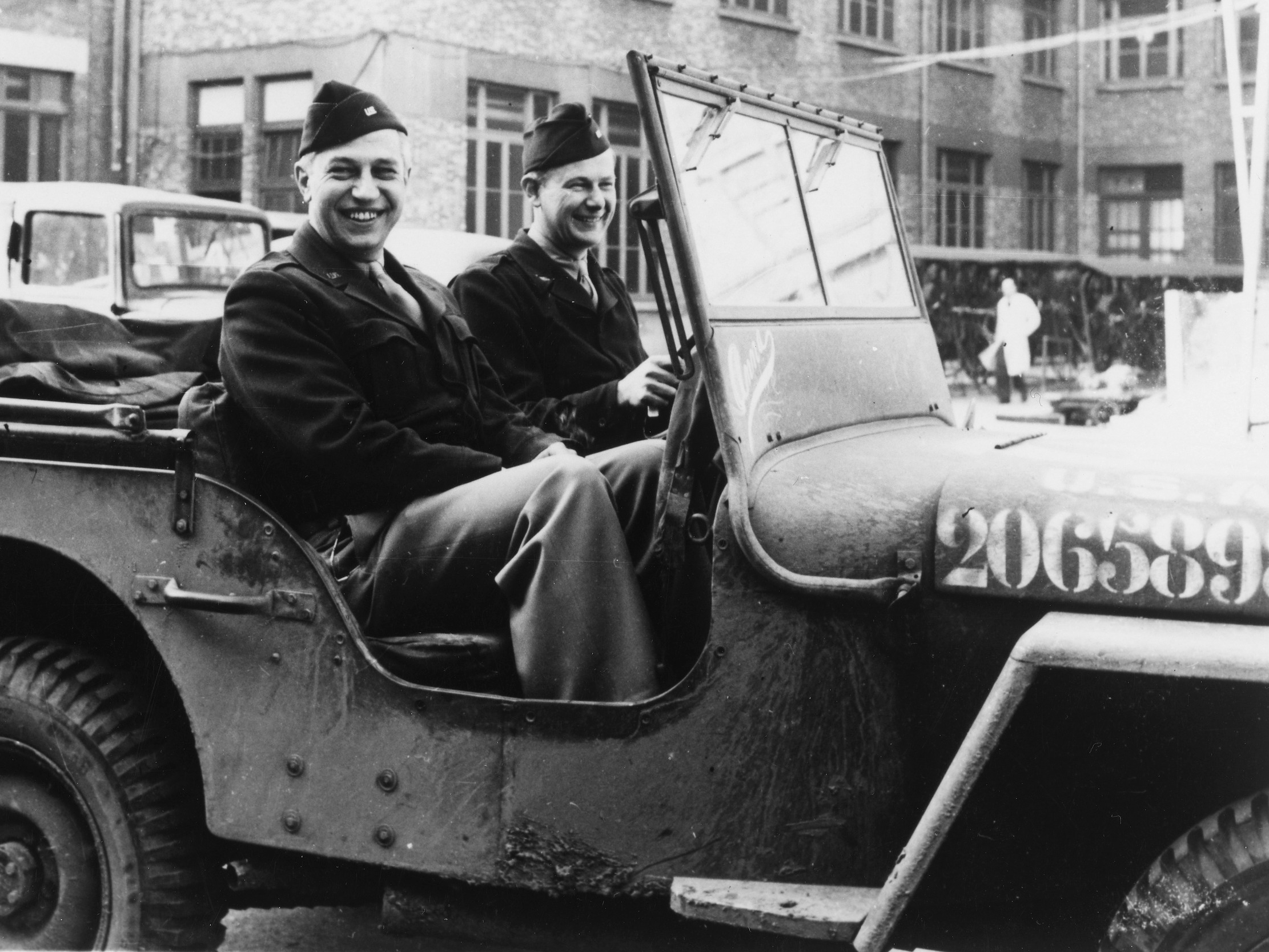 20-H, Lee A. DuBridge (left), director of the Radiation Laboratory, and John G. Trump (right), director of its British Branch, driving a U.S. Army Willys MB jeep in Paris.