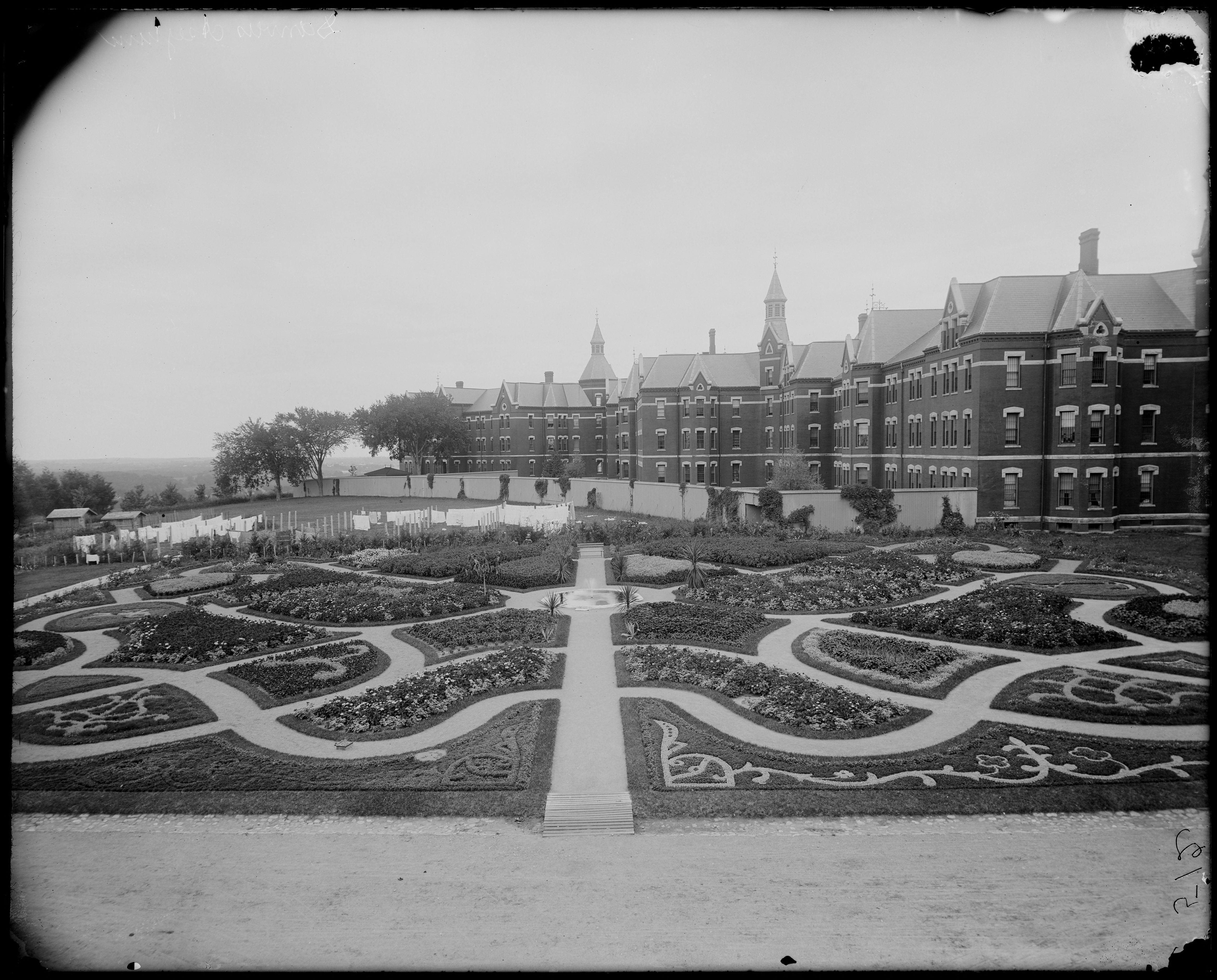 Danvers, Newbury Street, Danvers Insane Asylum, formal garden, by Frank Cousins, c. 1865-1914, from the Digital Commonwealth - commonwealth 2b88r662q.