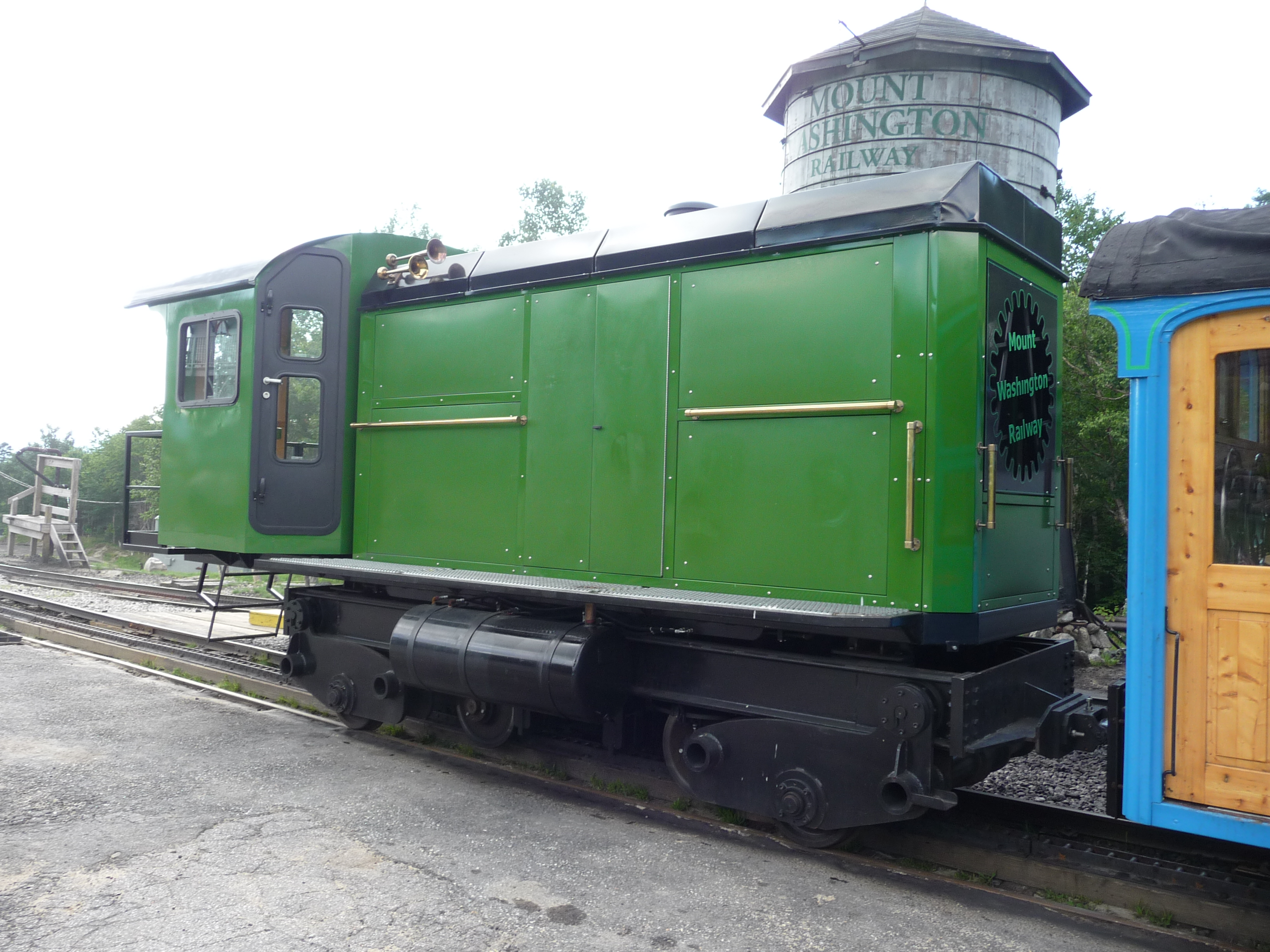 This Mt. Washington cog railway diesel locomotive, the first of its type, uses a hydraulic pump and hydraulic motor to turn the cog wheel to climb the mountain. On descent the cog hydraulic motor becomes a pump, and the engine pump is reversed to pull the hydraulic fluid past an orifice in the line to allow the engine to pull the car down the mountain. The orifice is opened completely when going up the mountain.