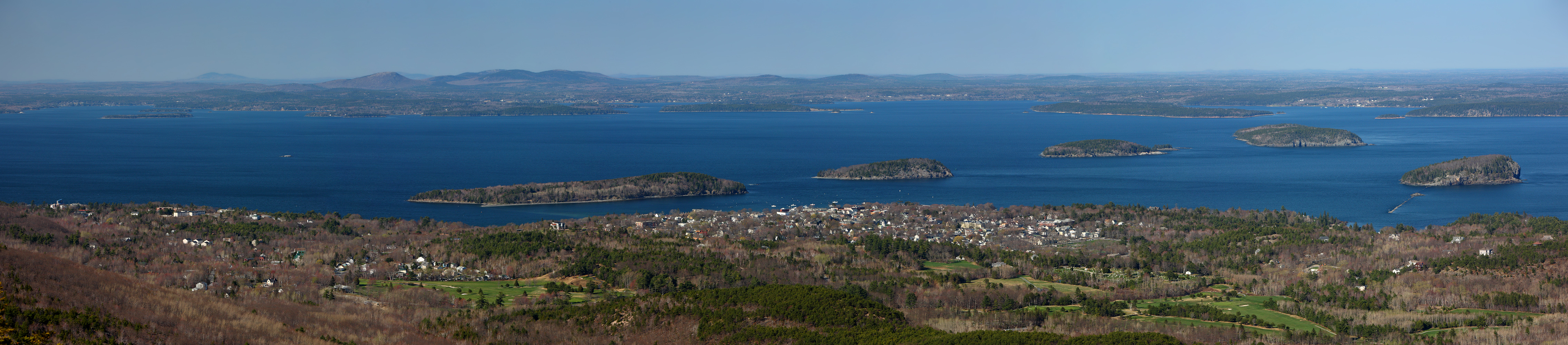 Frenchman Bay with Bar Island on the left and the Porcupine Islands (left-to-right: Sheep, Burnt, Long and Bald) around the town of Bar Harbor, Maine from the summit of Cadillac Mountain in Acadia National Park